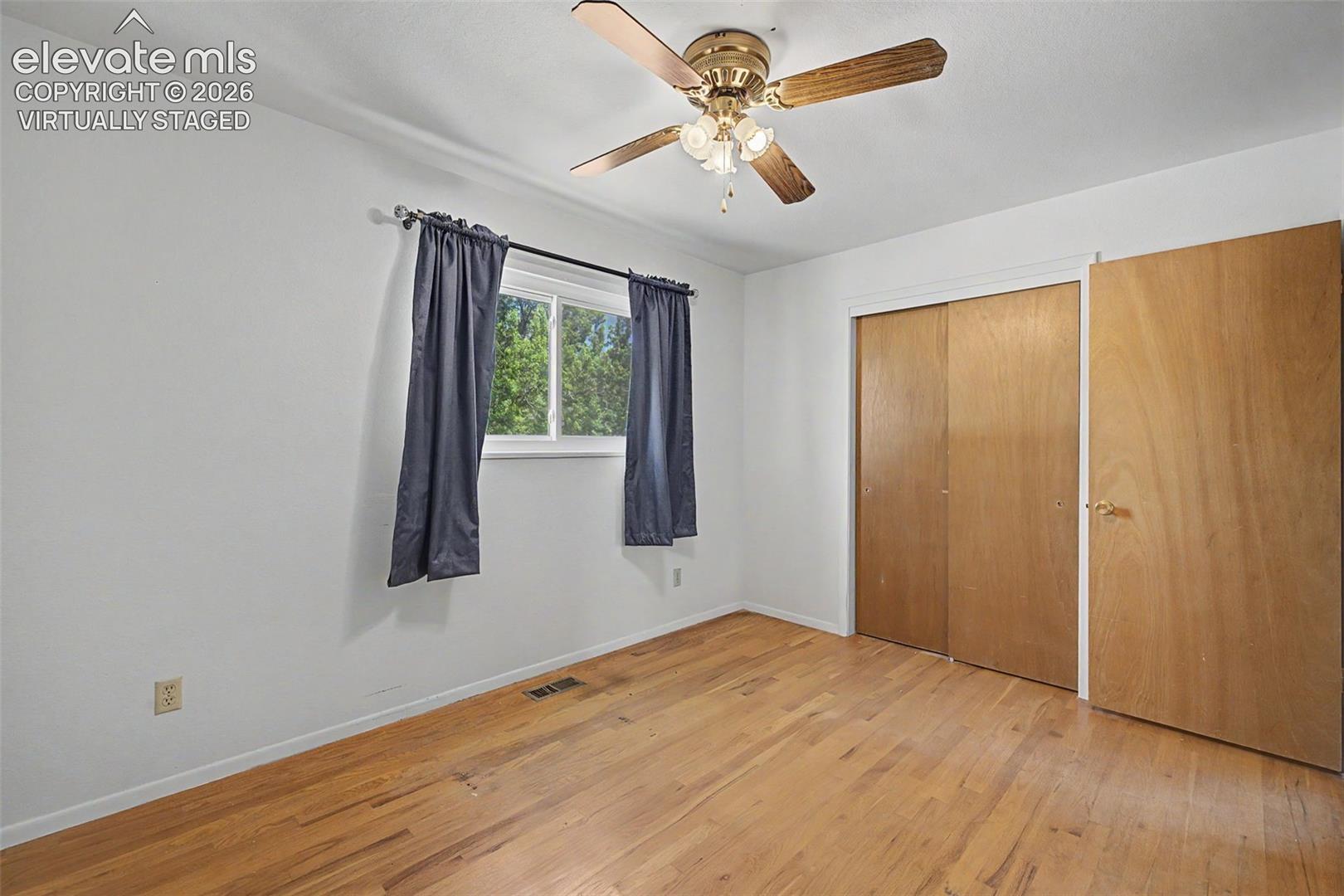 Virtually Staged with flooring - wood flooring under carpet