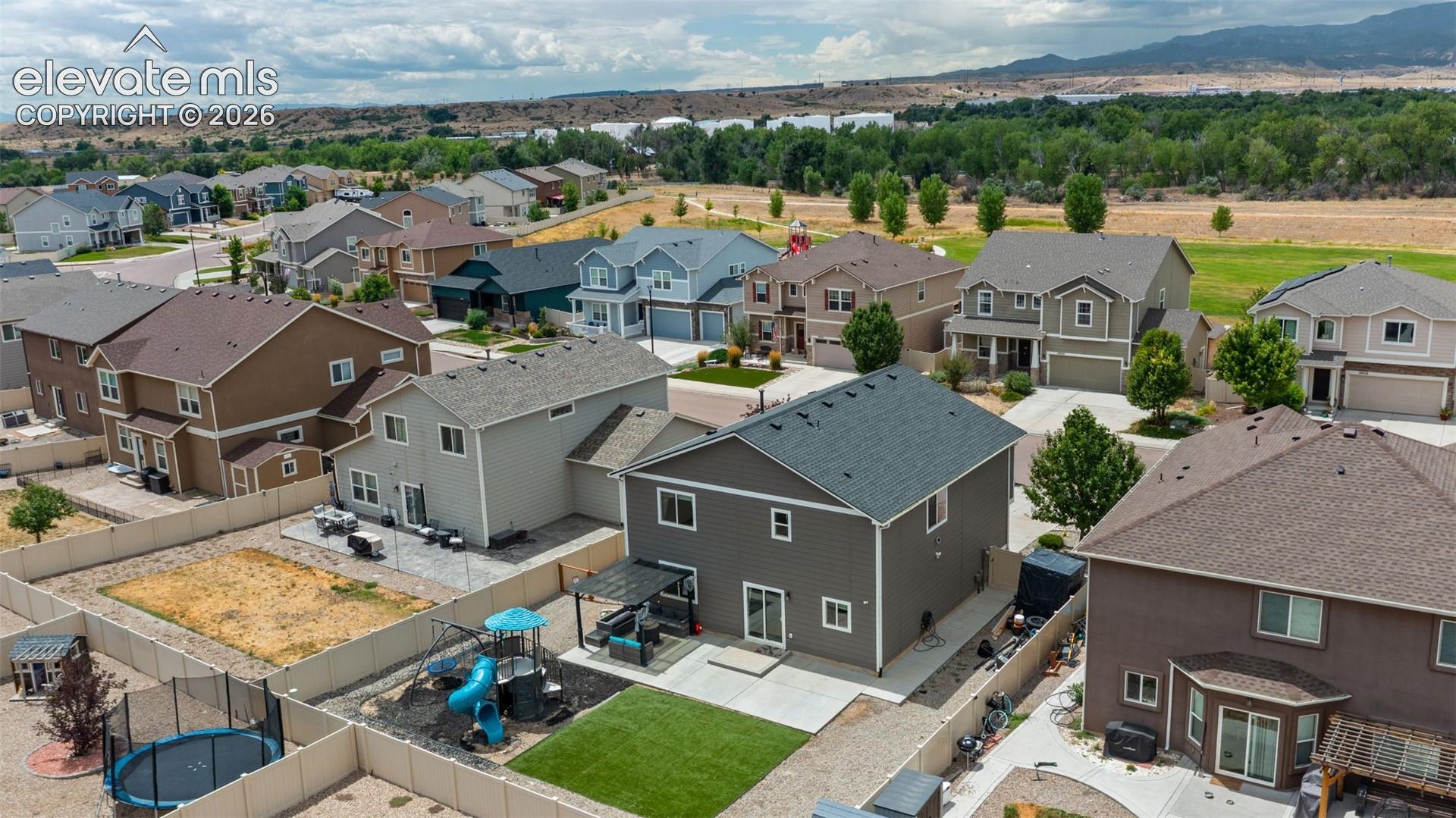 Aerial perspective showcasing a residential neighborhood with varied architectural styles
