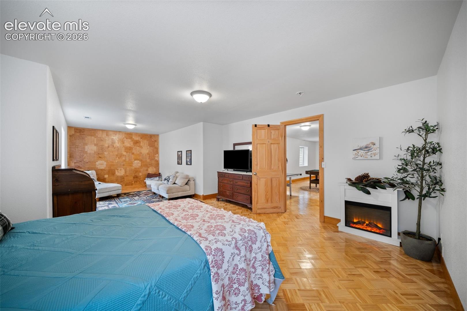 Basement bedroom with sitting area that can be a flexible space