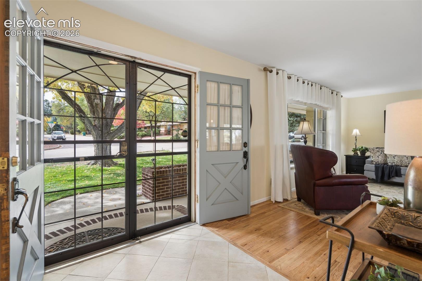 Dutch doors in entry to let in natural light