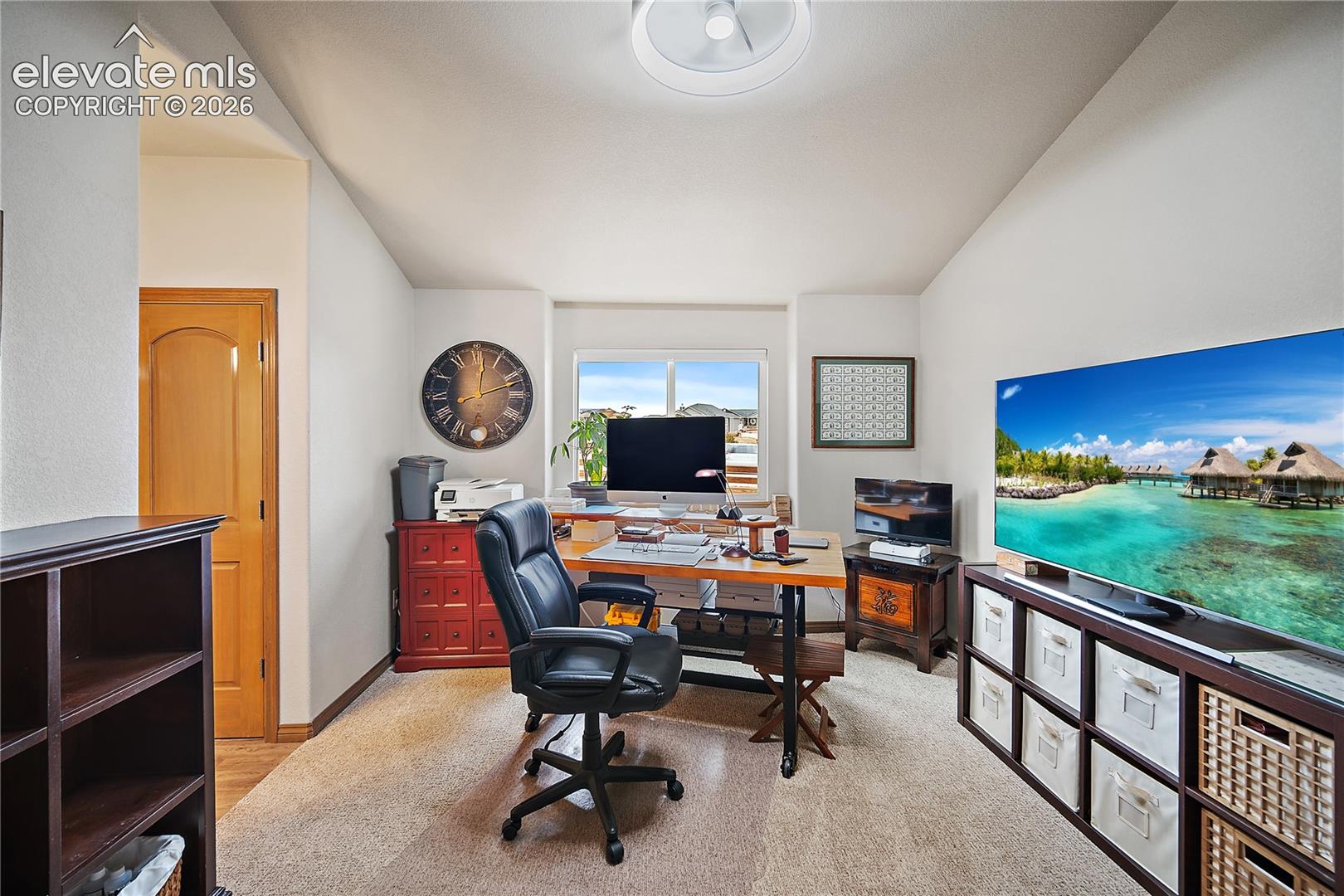 Main level bedroom (being used as an office space) Attached Jack n Jill bath and walk in closet. 