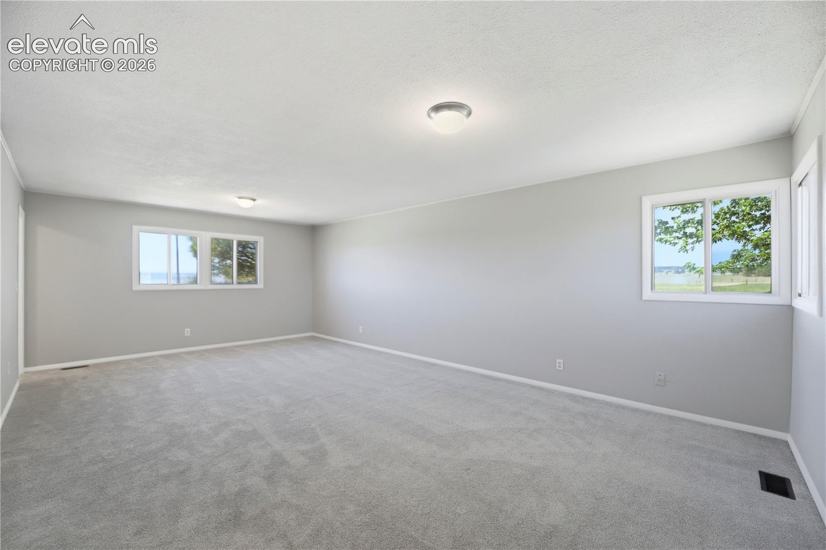 Carpet, Dual Closets, Primary Bath, Large Room, Windows All Around