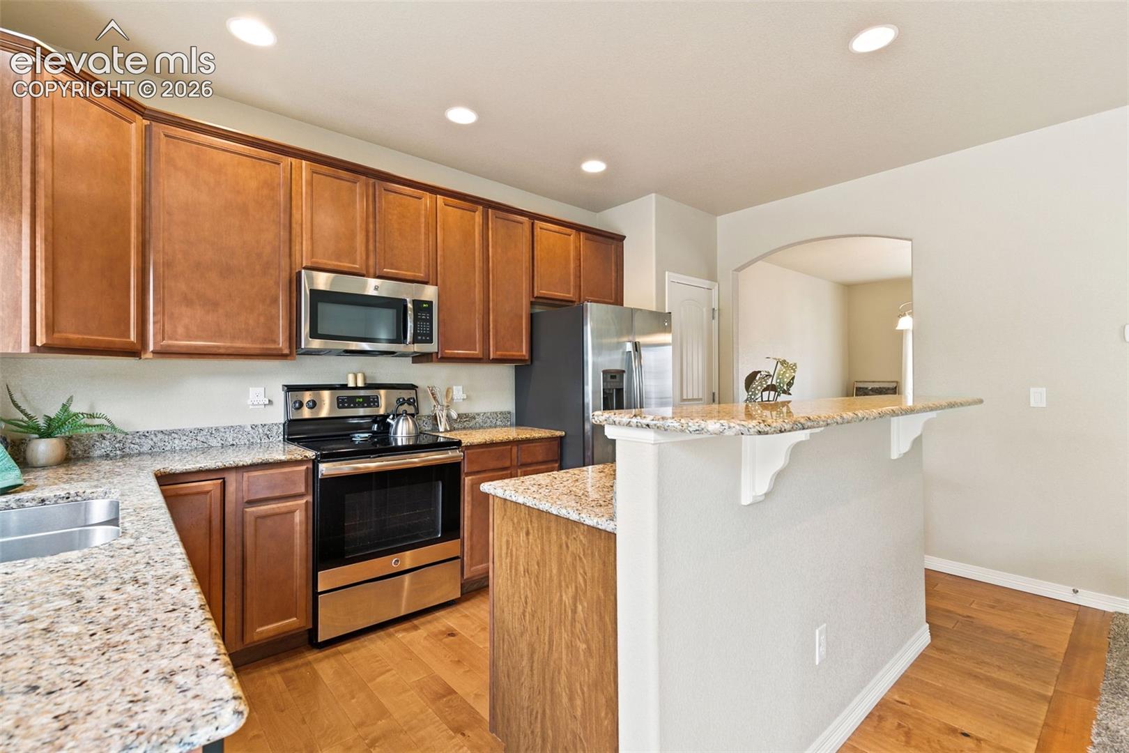 Kitchen featuring stainless appliances and granite countertops