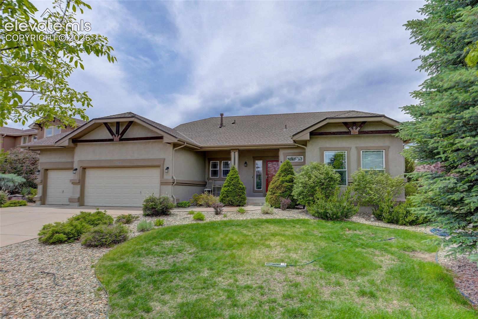 This mature 0.28-acre Pine Creek property offers a thoughtfully updated ranch home with exceptional functionality throughout. The open-concept main level creates an inviting flow for everyday living and entertaining, highlighted by quality finishes and spacious gathering areas designed for comfort and connection. Vaulted ceilings complement the natural lighting hardwood flooring. The kitchen features stainless steel appliances, an under-counter microwave, quartz countertops, a gas range with vent hood, a large pantry with custom shelving, and excellent storage. The dual islands provide generous space for meal prep and barstool seating. The breakfast nook & dining area are close at hand for additional dining options. When it’s time to relax, the living room offers a stunning stone-surround gas fireplace and walk-out to the back deck. Enjoy the beauty of Colorado from both the covered deck and open terrace with a built-in grill and a backyard water feature. The main-level primary suite provides a comfortable retreat at the end of the day with wide doorways, a spacious walk-in closet, and 5-piece bath featuring a zero-entry shower. Three bedrooms include attached baths, offering flexibility and privacy. The lower level features newly refinished walls & expands the home's versatility with an additional entertainment area, a kitchenette with refrigerator and microwave, and a dedicated exercise room. Designed with convenience and accessibility in mind, this ADA-compliant home offers a garage entry ramp, wheelchair-accessible sink, and electric blinds with extension wands. Conveniently located with easy access to local schools, parks, shopping, and the Powers corridor.