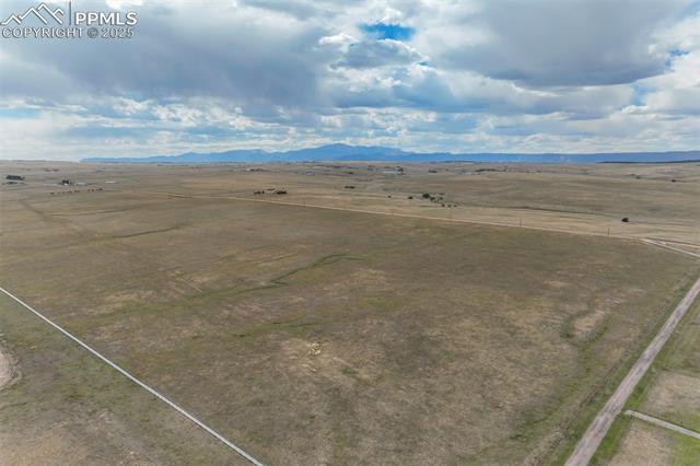 Drone / aerial view featuring a mountain view