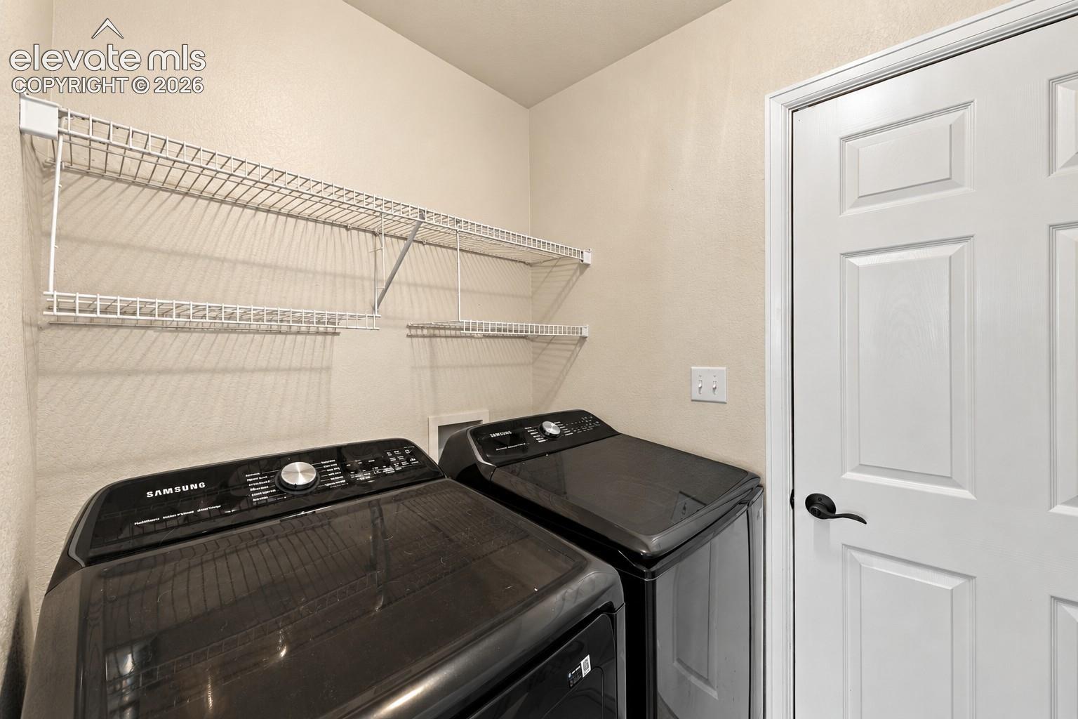 White wire shelving system provides storage