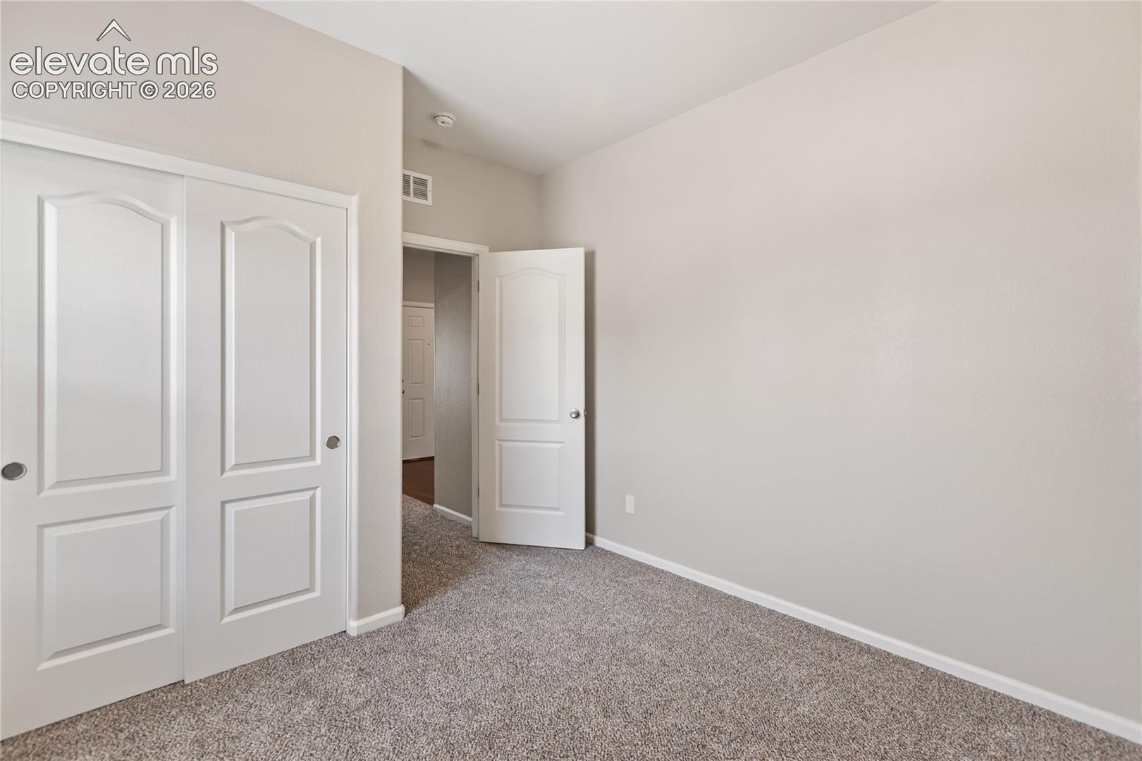 Bedroom #2 - new carpet, freshly painted!