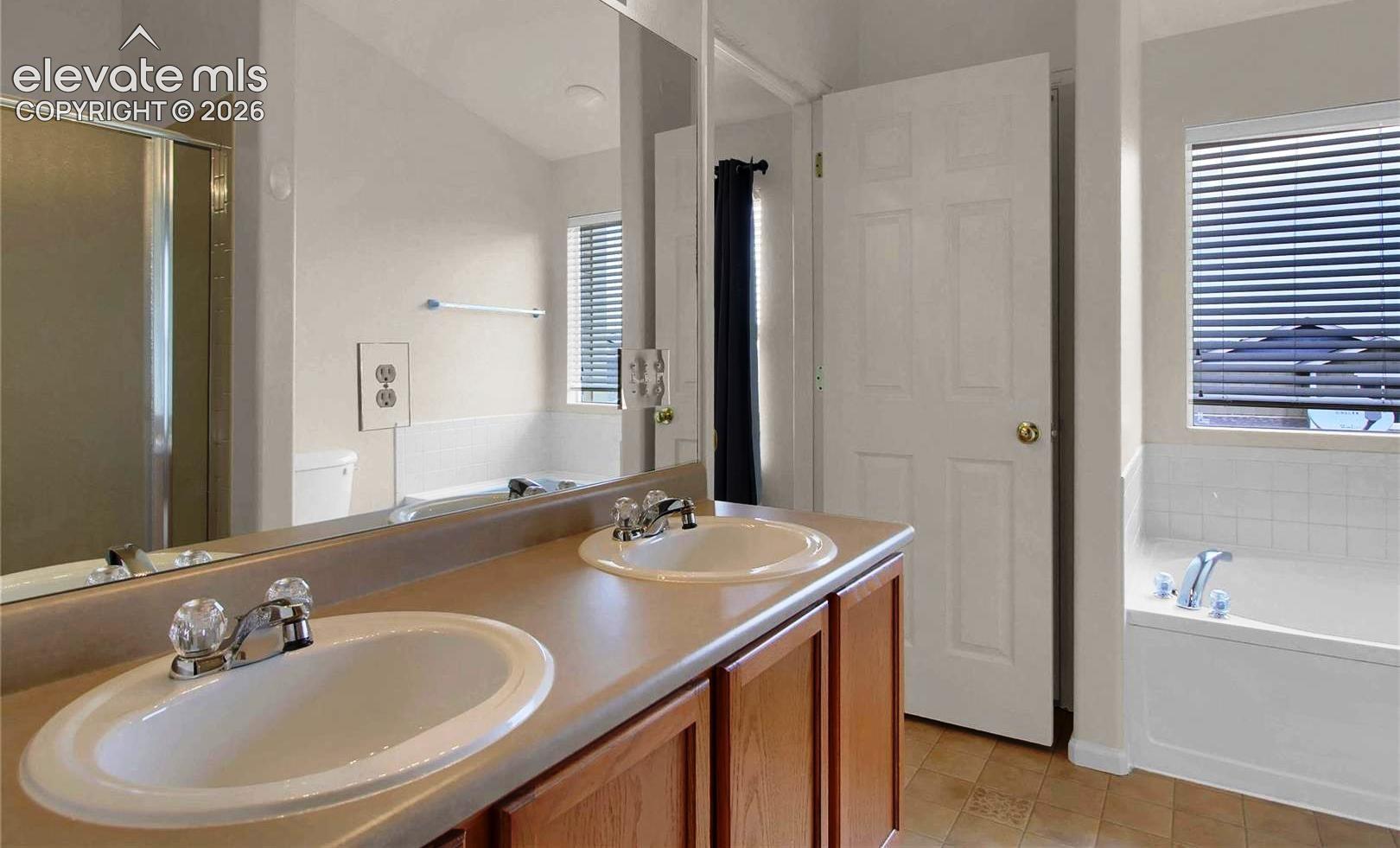 When vacant primart facing garden tub and entrance