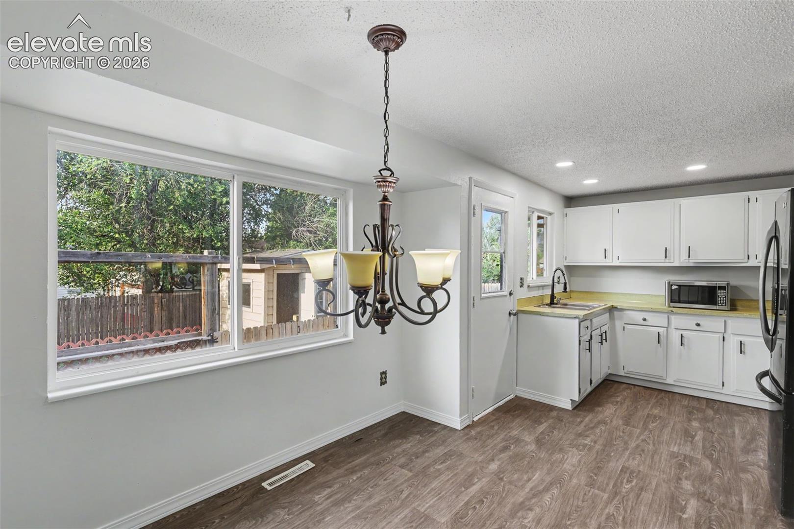 Functional kitchen layout with open flow into the dining area.