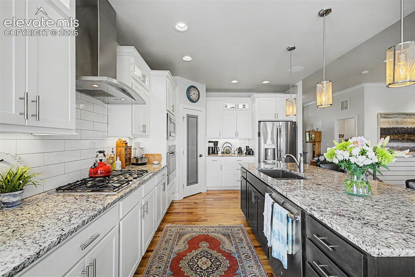 Gas stove, custom vent and a coffee bar too!
