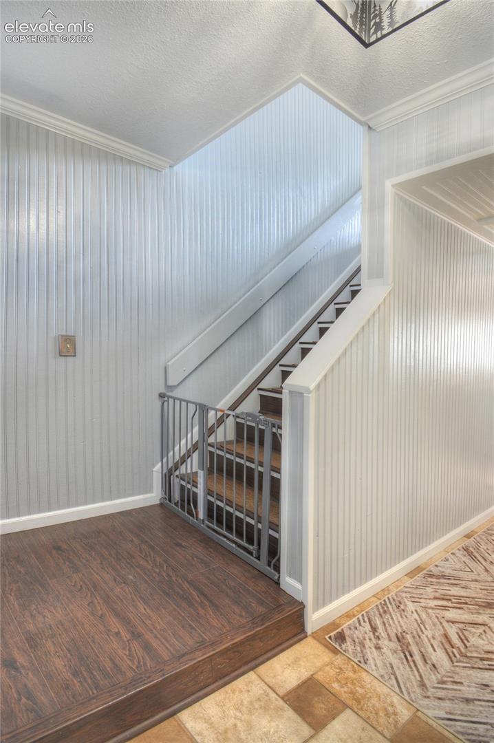 LVP landing and stairs leading to upper level.