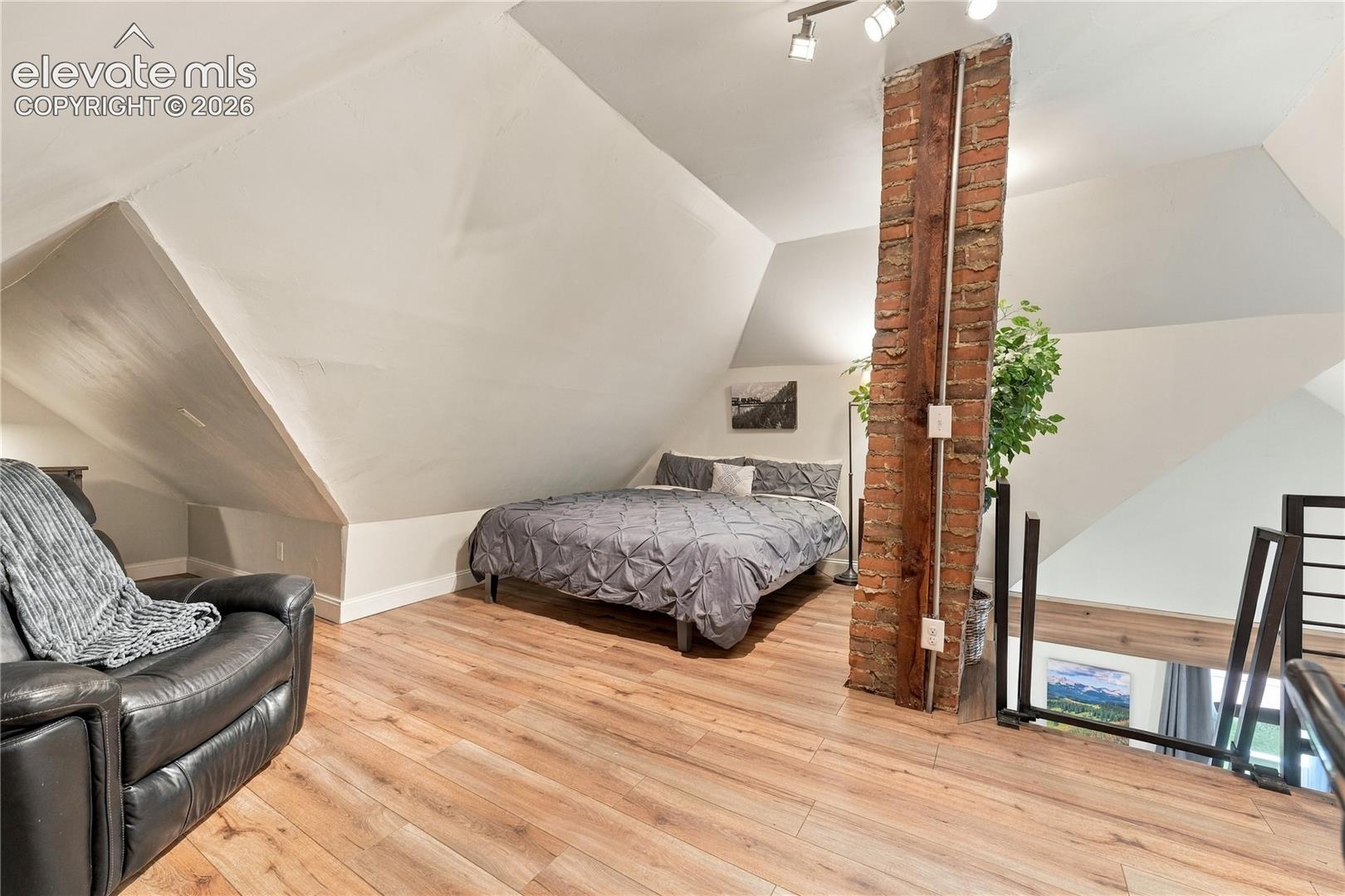 Loft space large enough for guest space, office or craft area.