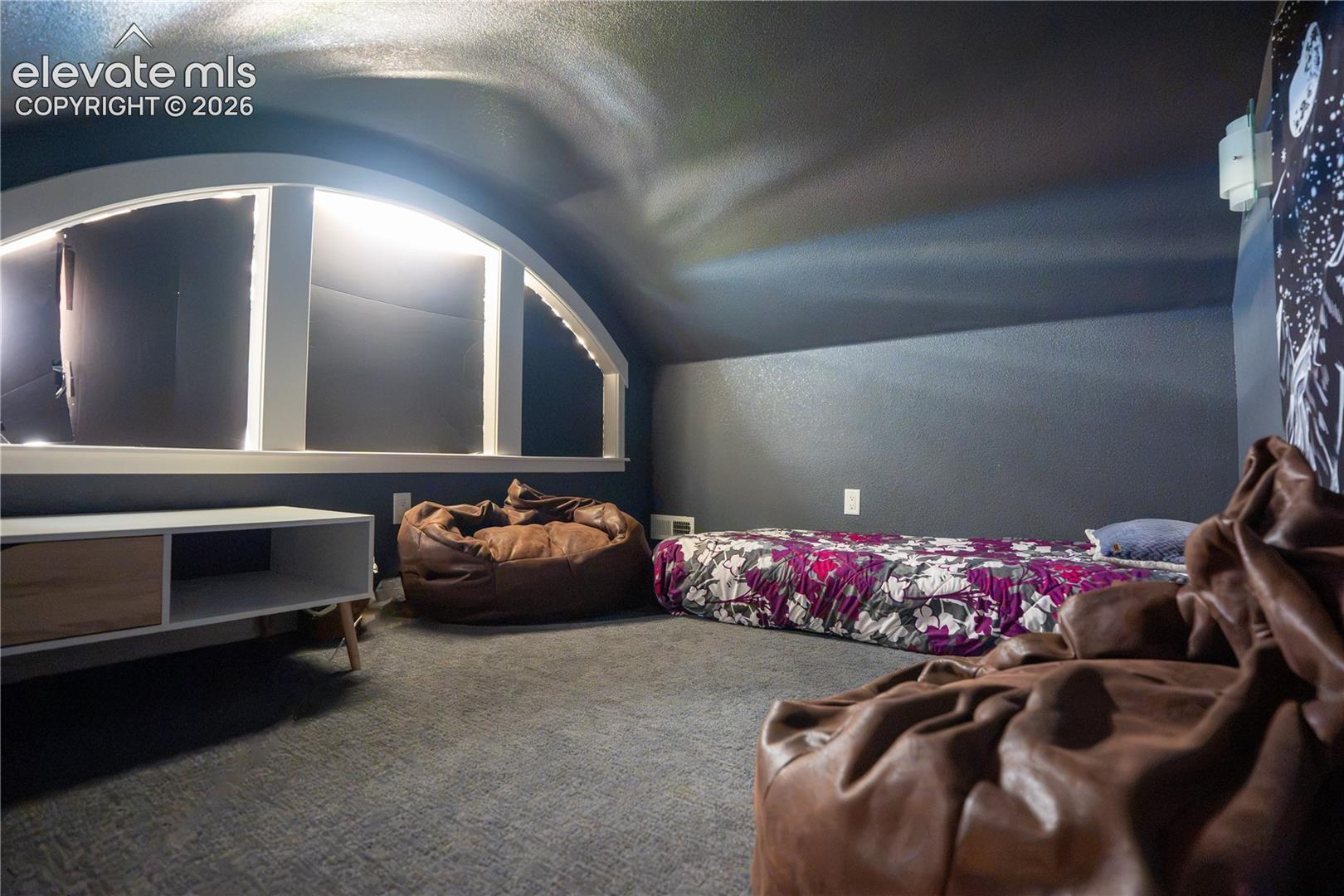 There are a couple of stairs that lead to this secret hideaway. Any child would love this!