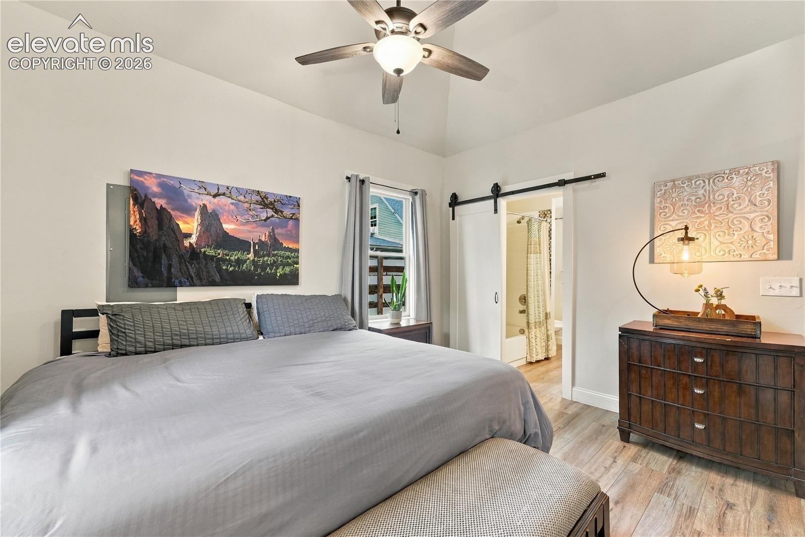 Opposite view of the bedroom suite with high ceilings.