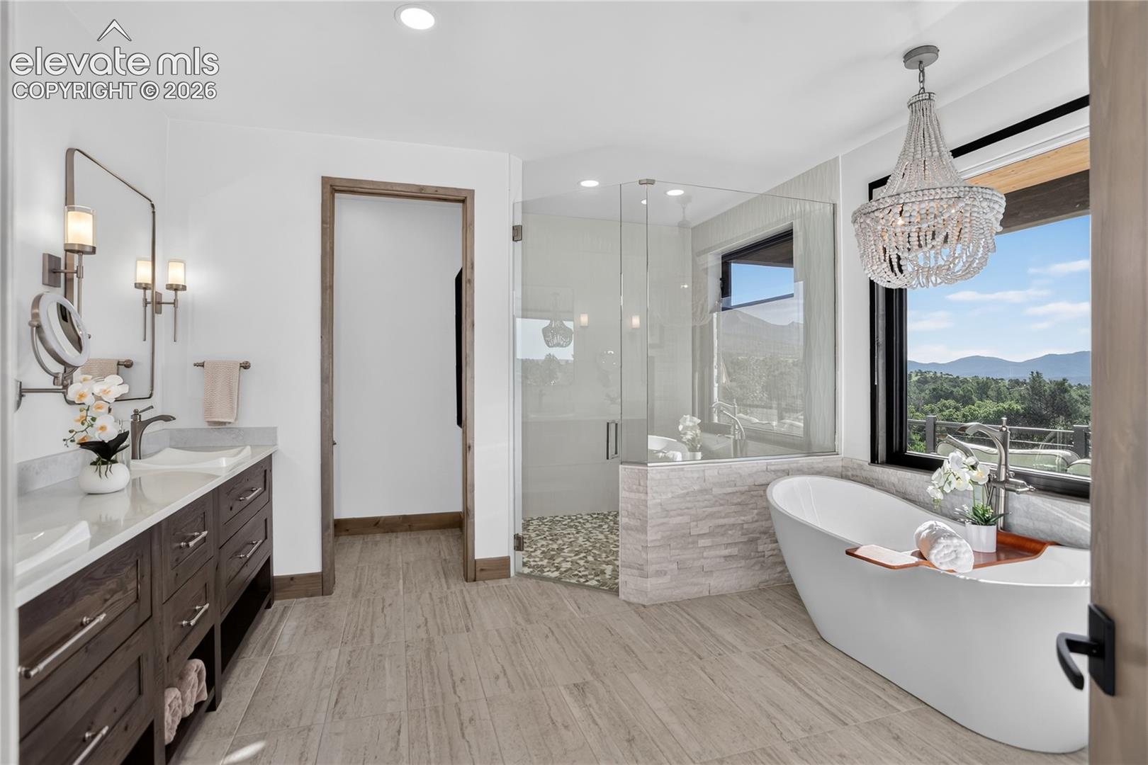 Primary bath w/ mountain views & walk-in shower