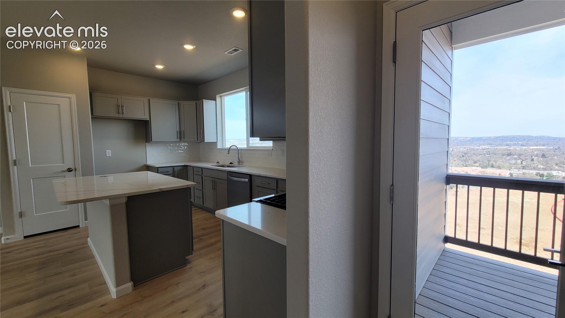 Private covered composite deck off the Kitchen! 