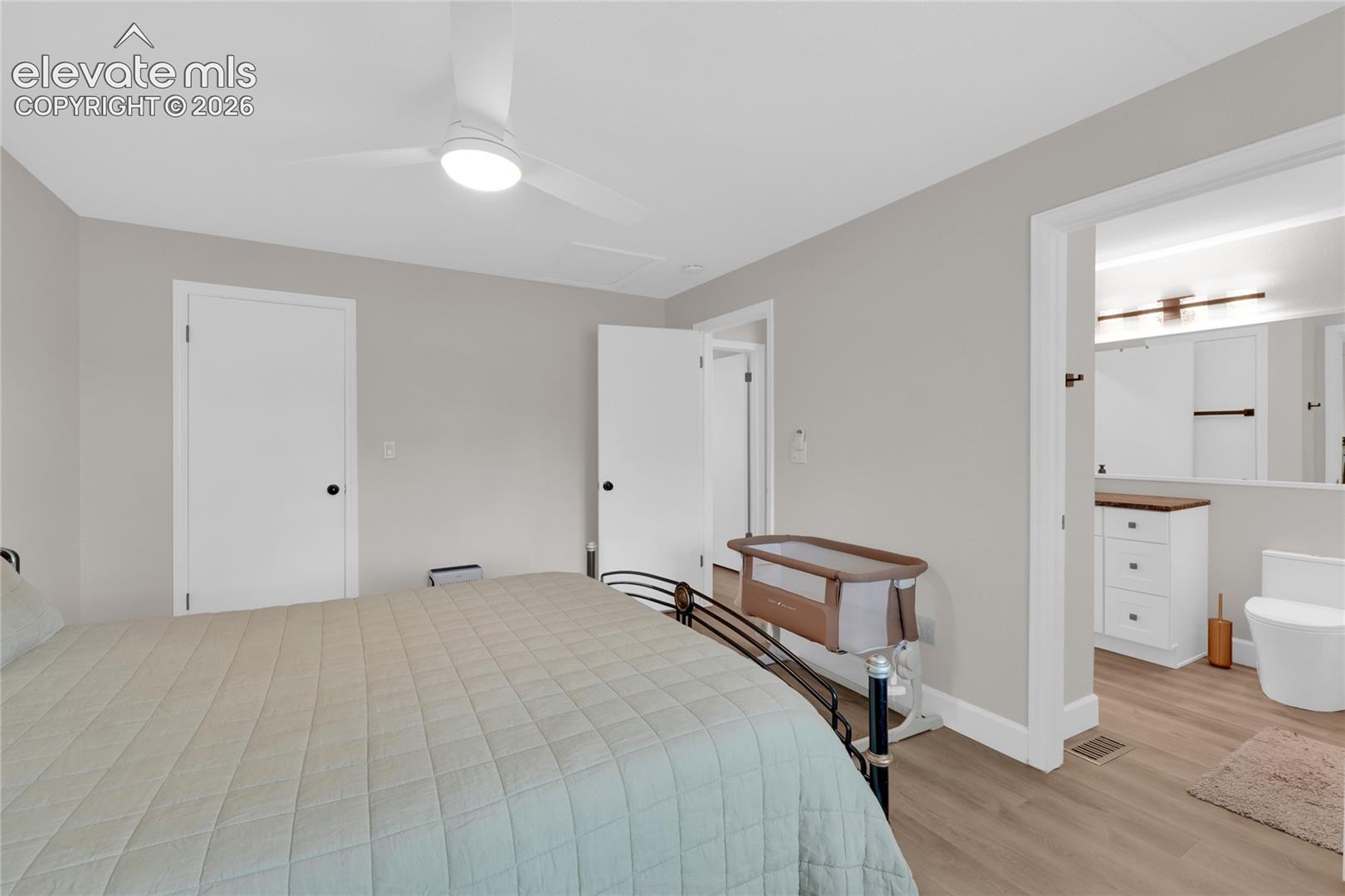 Primary bedroom with bathroom access.