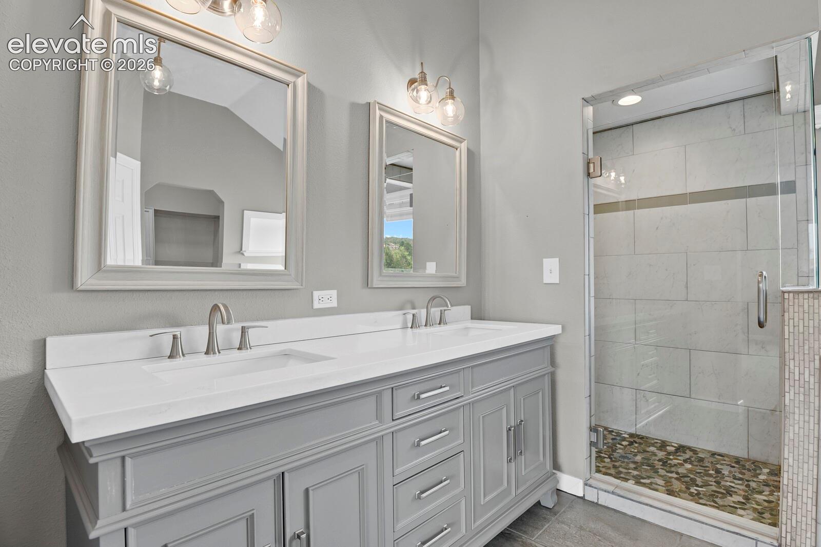Dual sinks, heated floors,walk-in shower, & separate water closet