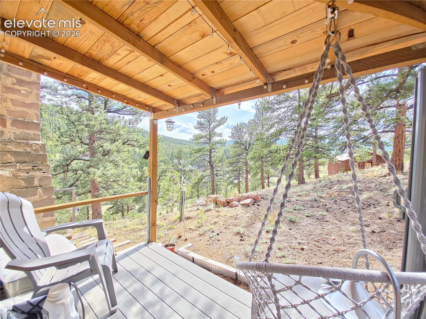 Deck/Porch added on w/ roof and privacy shades installed