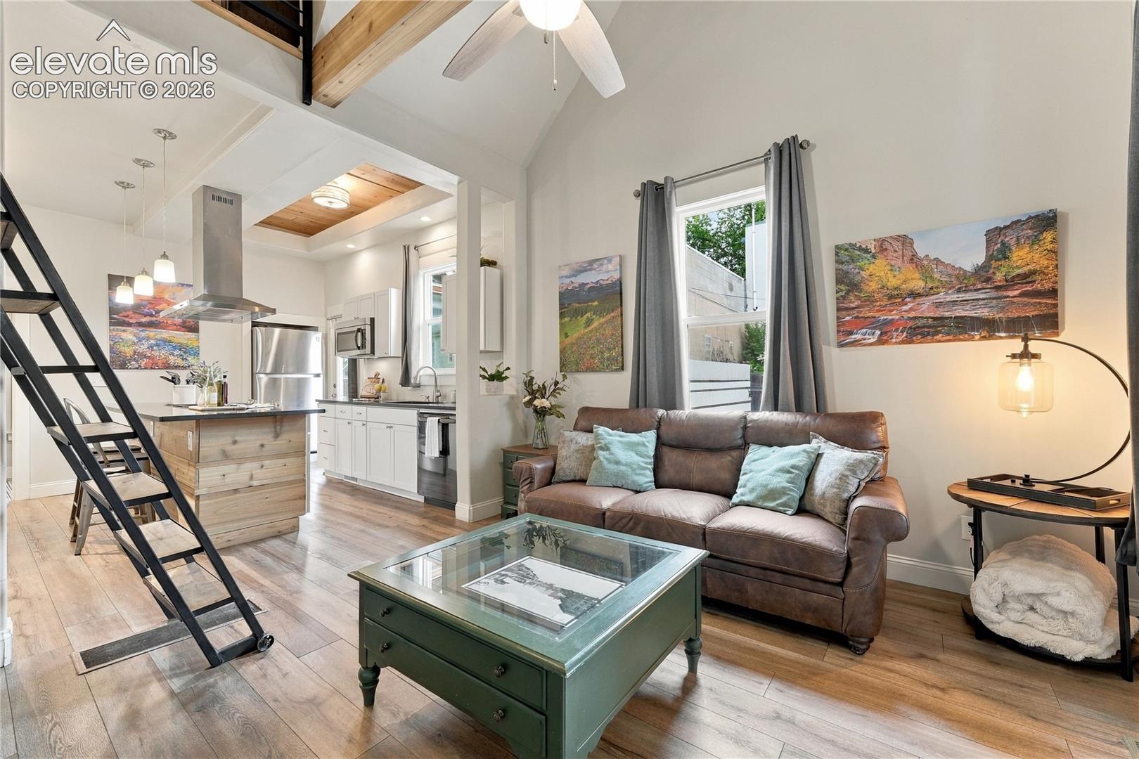 Opposite view of the living room and entry.