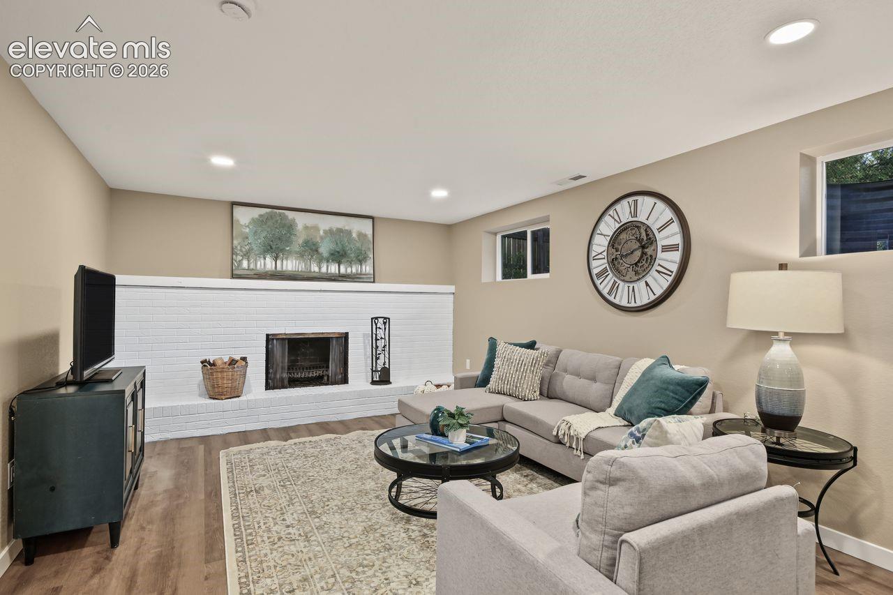 Updated beautiful lower area with faux fireplace
