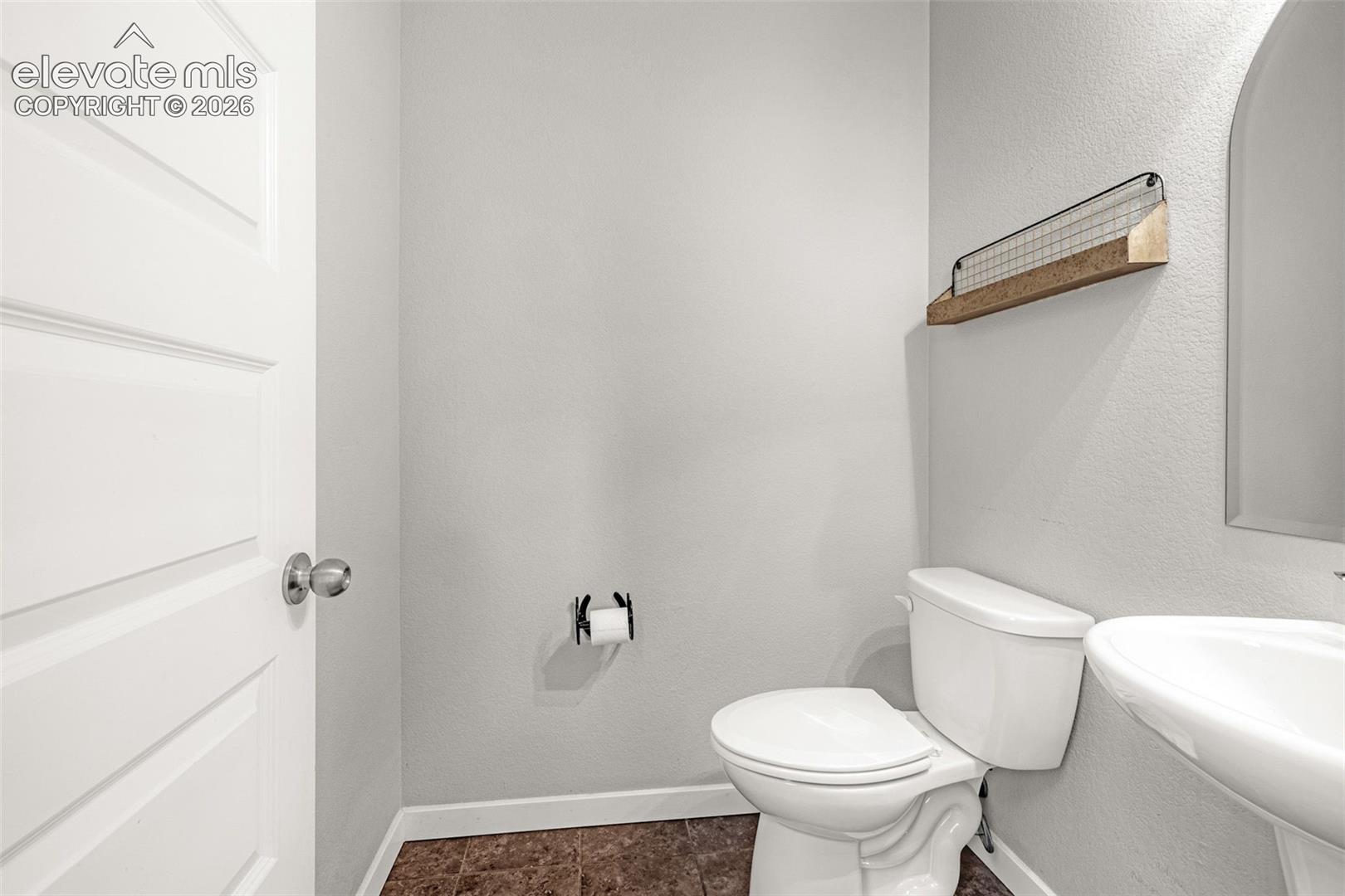 White paneled door with polished chrome hardware