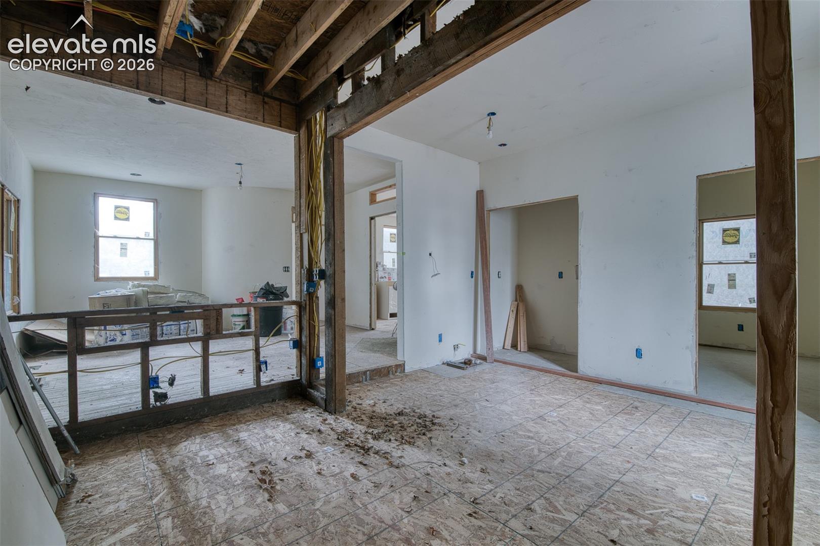 View from kitchen area into dining and living room 