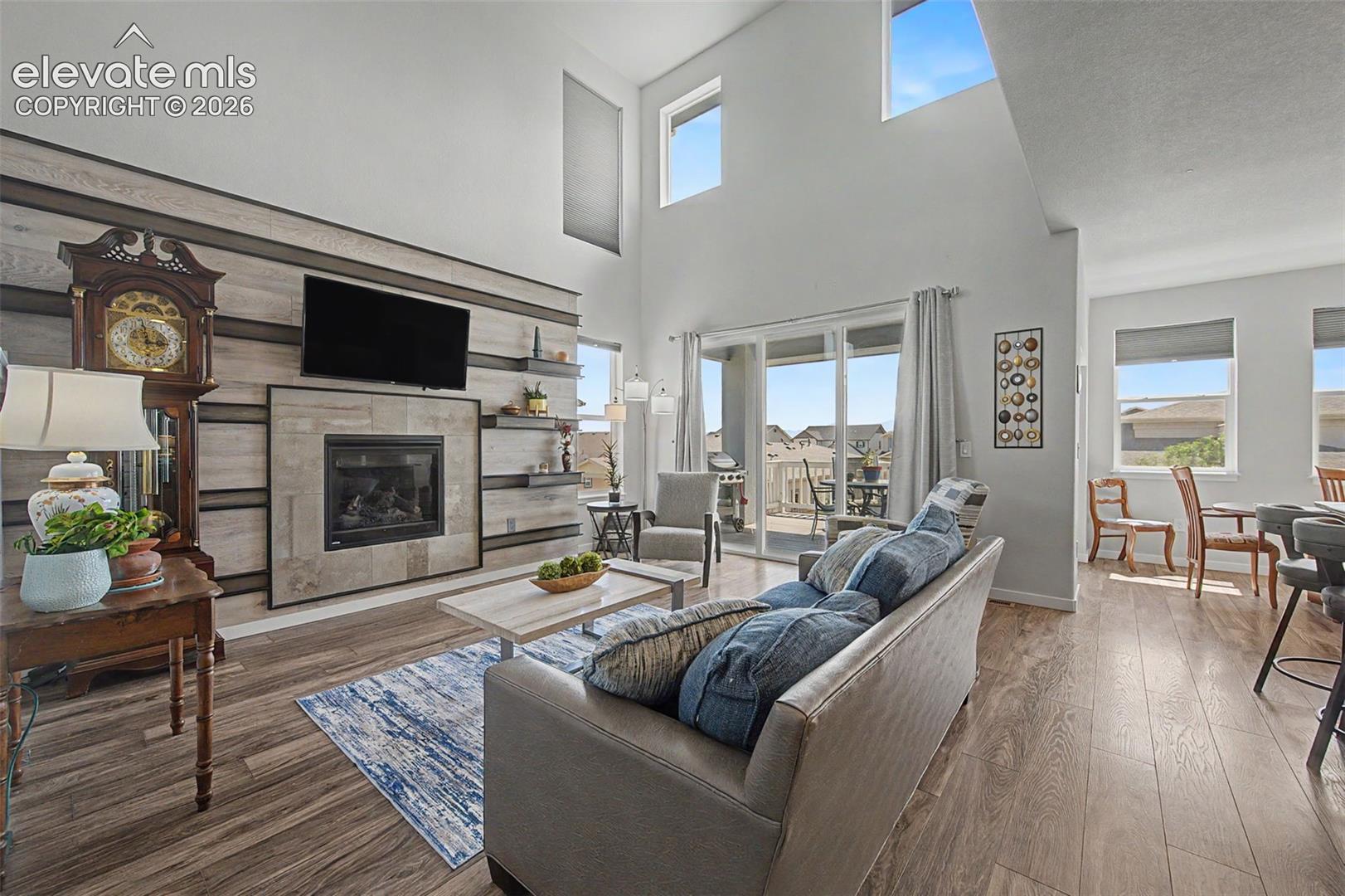 The dramatic 2-story ceilings add a bright and airy feel to the living area.