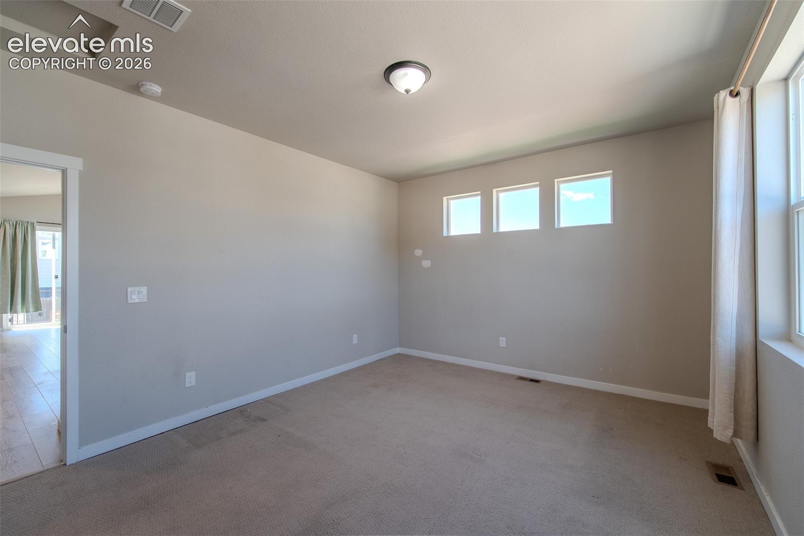 Upper Level Primary Bedroom.