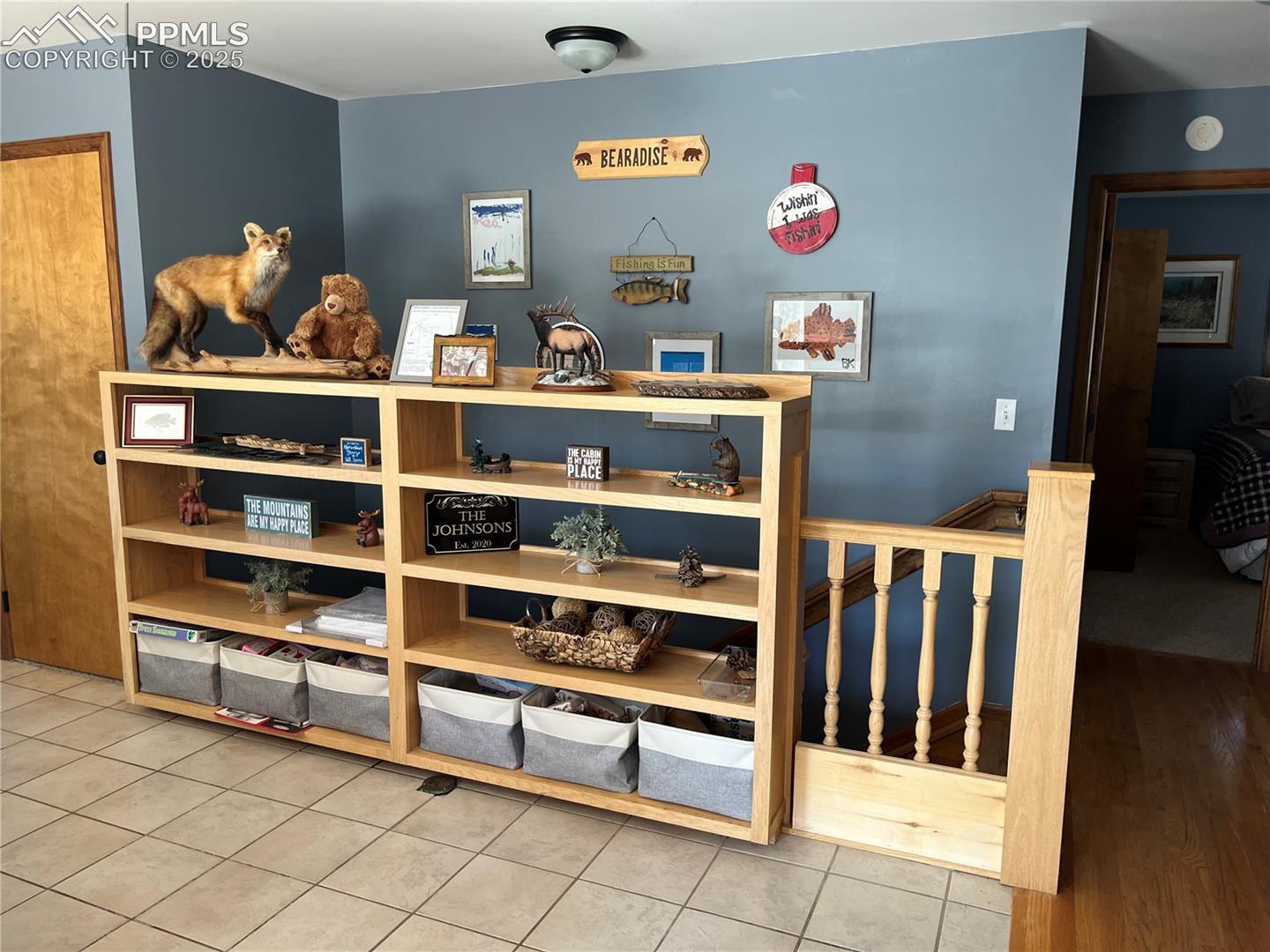 On the upper entrance there is a tiled entry with closet and shelving.