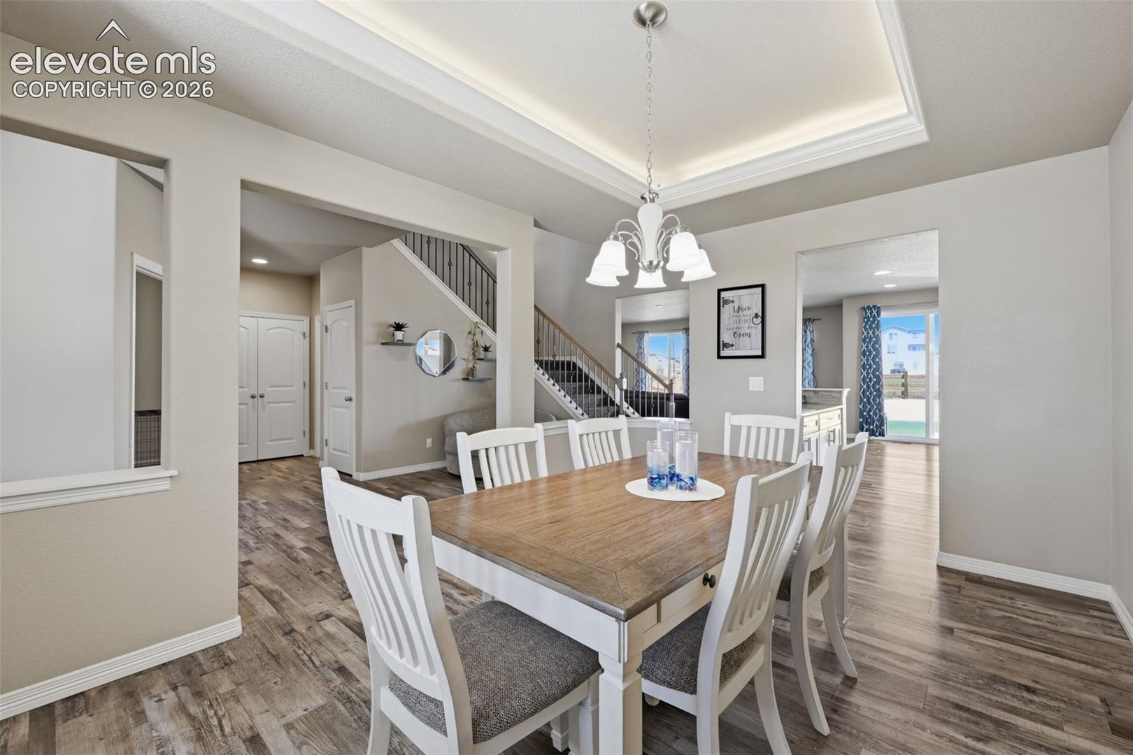 Formal Dining Room with Backlit Tray Ceiling — Ready for Holidays & Special Gatherings