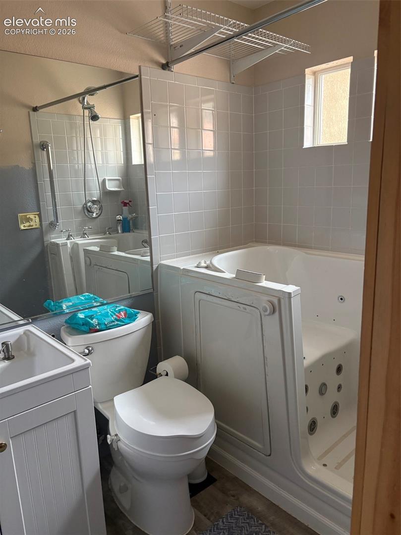 Second bathroom with walk in tub