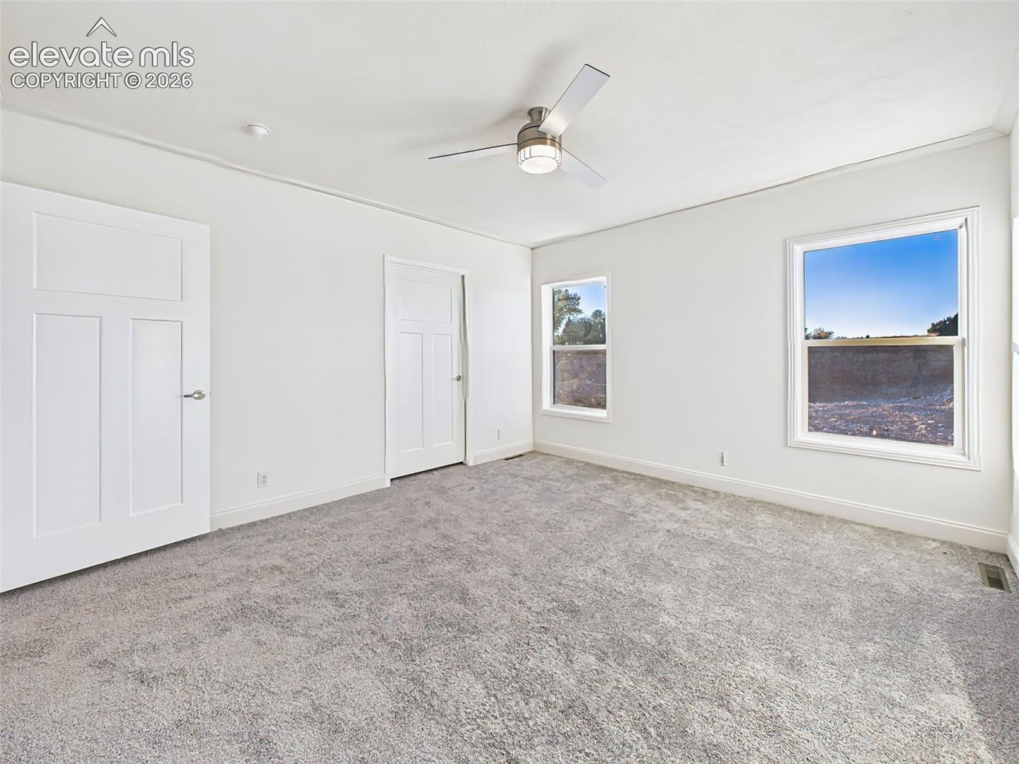 Unstaged layout highlighting walk-in closet entry and access to private bath.