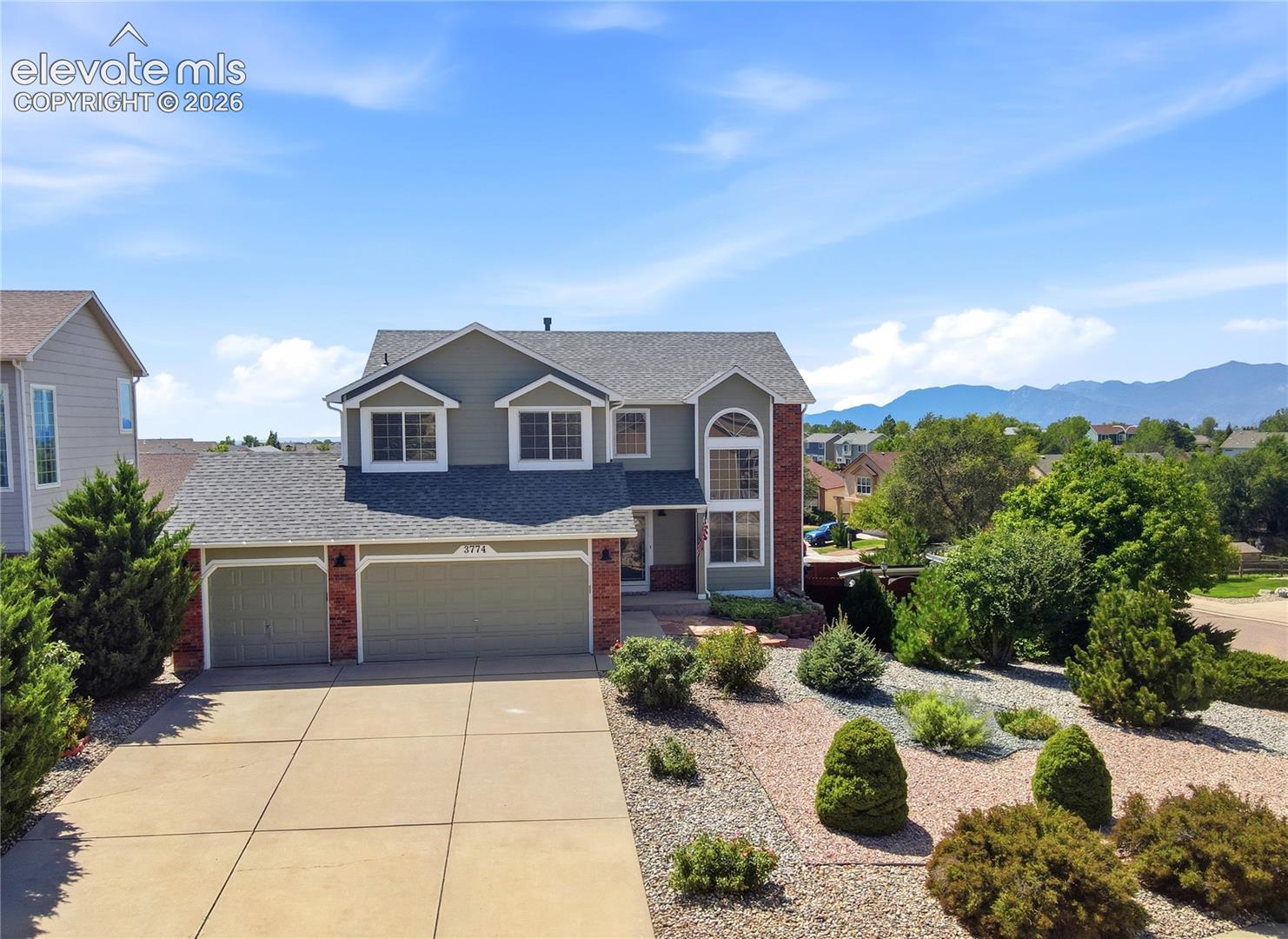 Incredible Pikes Peak & city-light views set the stage for this beautifully maintained home in a very PRIVATE setting * Bright, open two-story floor plan offers the space & flexibility buyers are looking for beginning with the soaring, two story vaulted formal living room & dedicated formal dining room, ideal for entertaining * Eat-in kitchen is at the hub of the home featuring newer appliances, generous cabinetry, center island and easy walk-out access to the deck, where sweeping Front Range * Pikes Peak views create an impressive backdrop * The adjoining family room offers a comfortable gathering space with a gas fireplace boasting entertainment niches while a separate main-level office with glass French door provides an ideal work-from-home setting * Upstairs, all four bedrooms are conveniently located on one level including a luxurious primary suite with a 5-piece bath & generous walk-in closet plus an upper-level laundry area * Full, unfinished walkout basement offers tremendous potential for future bedrooms, recreation space, home theater, gym or additional living areas * Outside is where this home really stands apart * Enjoy multiple outdoor living spaces to include the lower expanded deck, perfect for relaxation while enjoying the fully fenced rear yard *  Fire-pit inspired patios & mature landscaping are a true bonus * Owner has created a private space through a custom arched gate and pergola creating a seamless transition to perennial gardens, dedicated grilling station accessible for all seasons, magnificent “She Shed” perfect as a studio, hobby space, garden retreat or private getaway right in your backyard * Elevated deck is an ideal place to take in spectacular sunsets over Pikes Peak and sparkling city lights twinkling in the distance *  * 3-car garage & Central Air * Near parks, schools, shopping & amenities that complete the package * Great indoor space, exceptional outdoor living & Colorado views that are hard to beat!