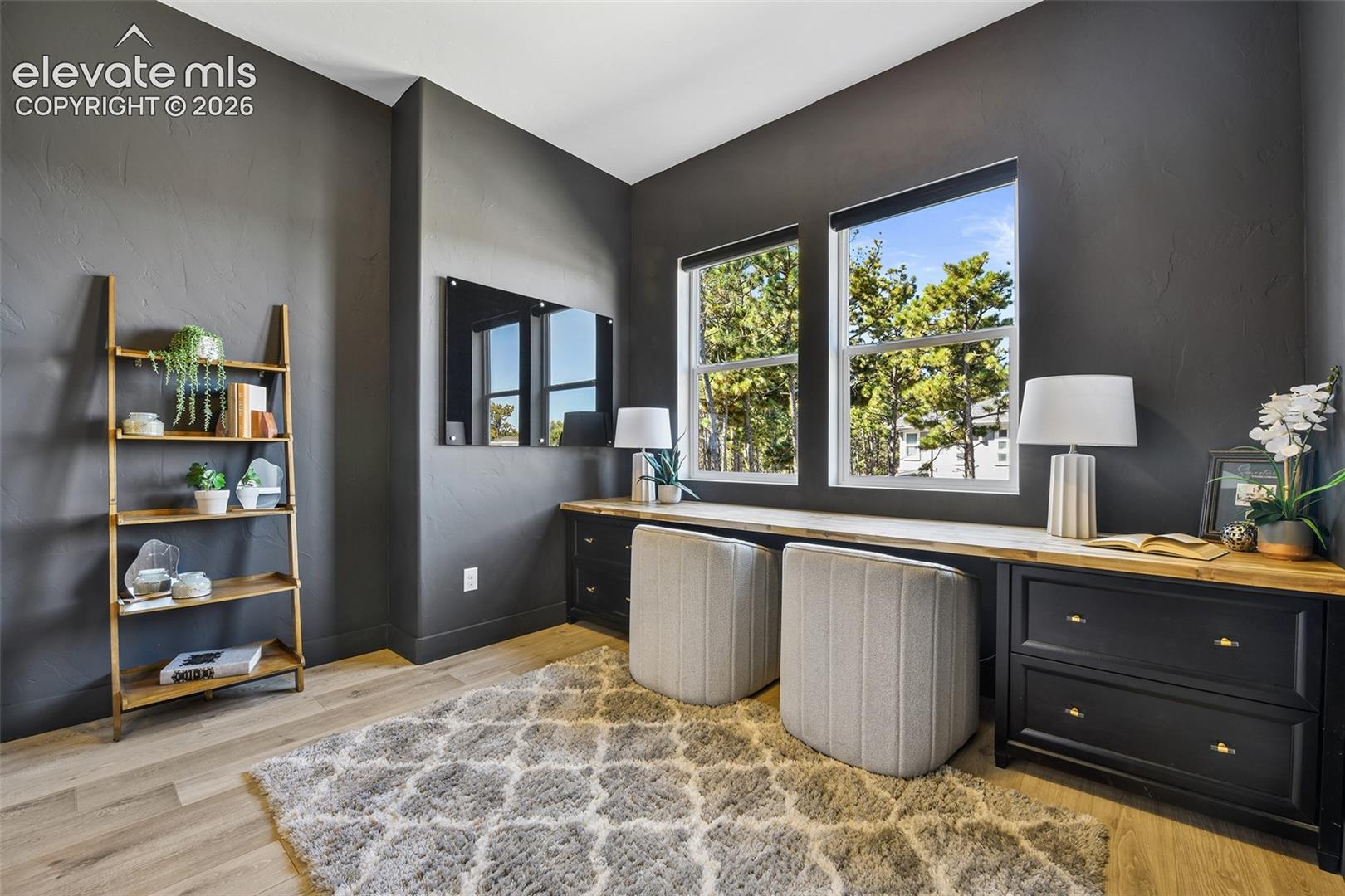Spacious main level office with built-ins and mountain views