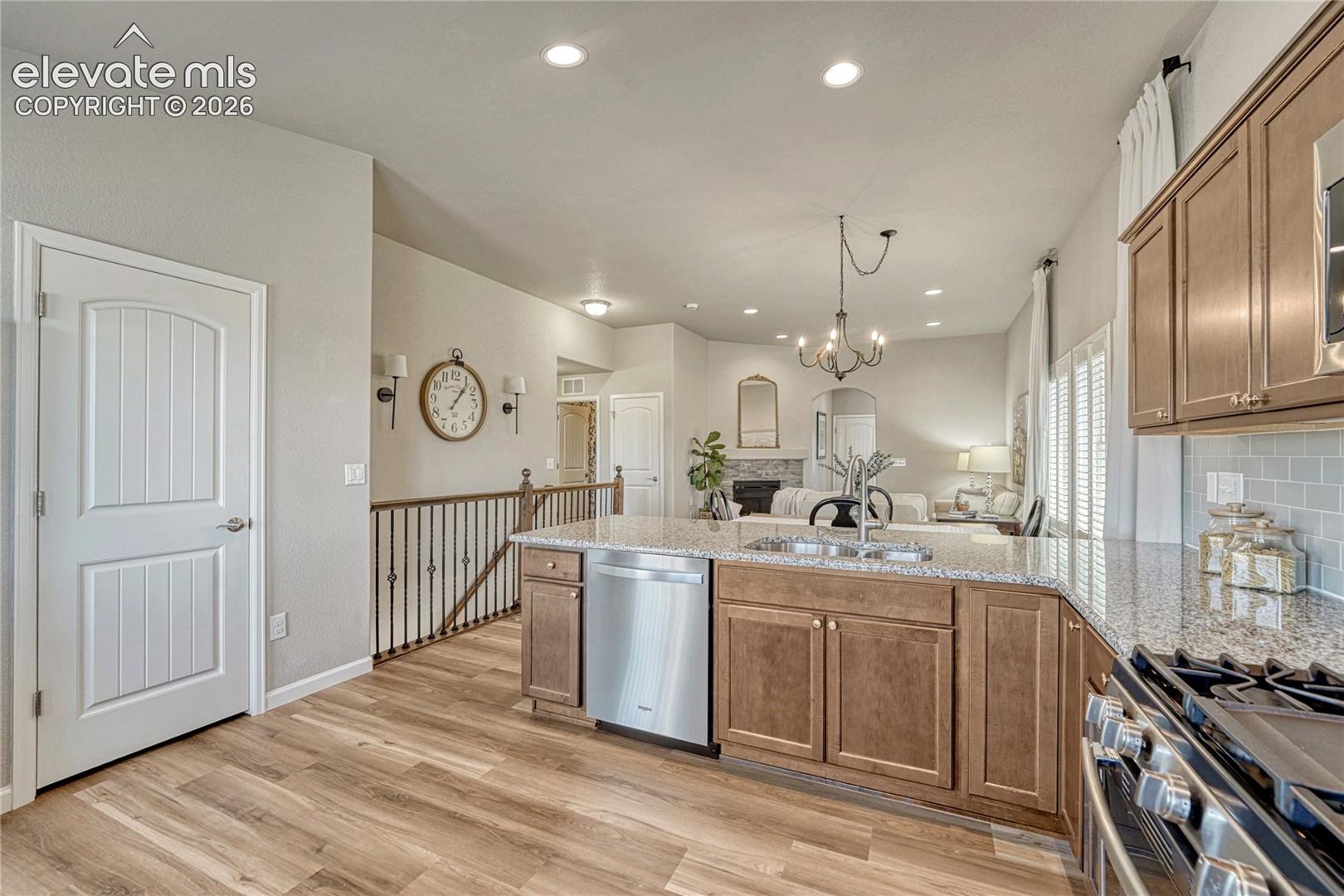 This open kitchen layout provides the perfect connection between cooking, dining, and relaxing.