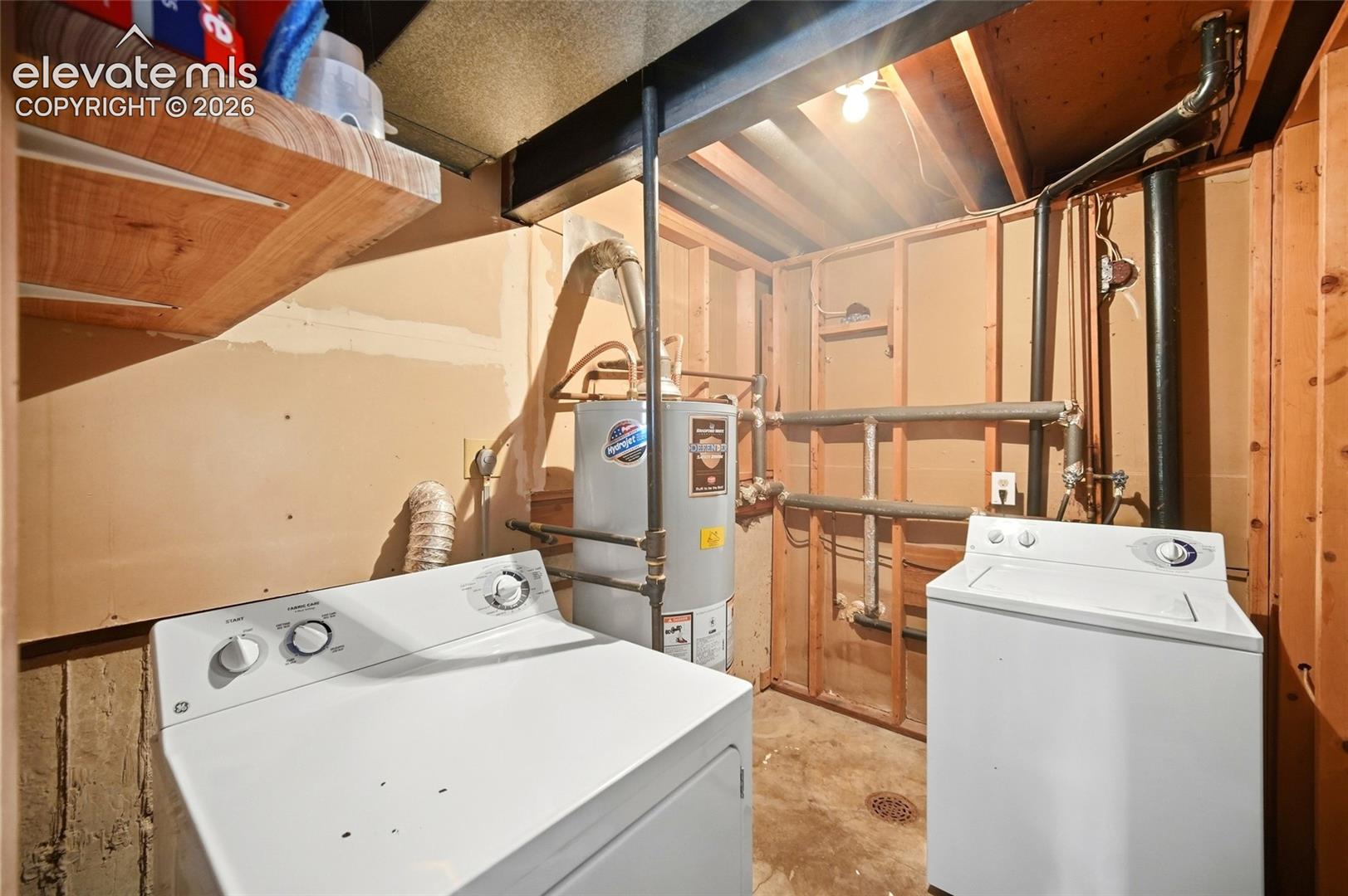 Lower level unfinished laundry room