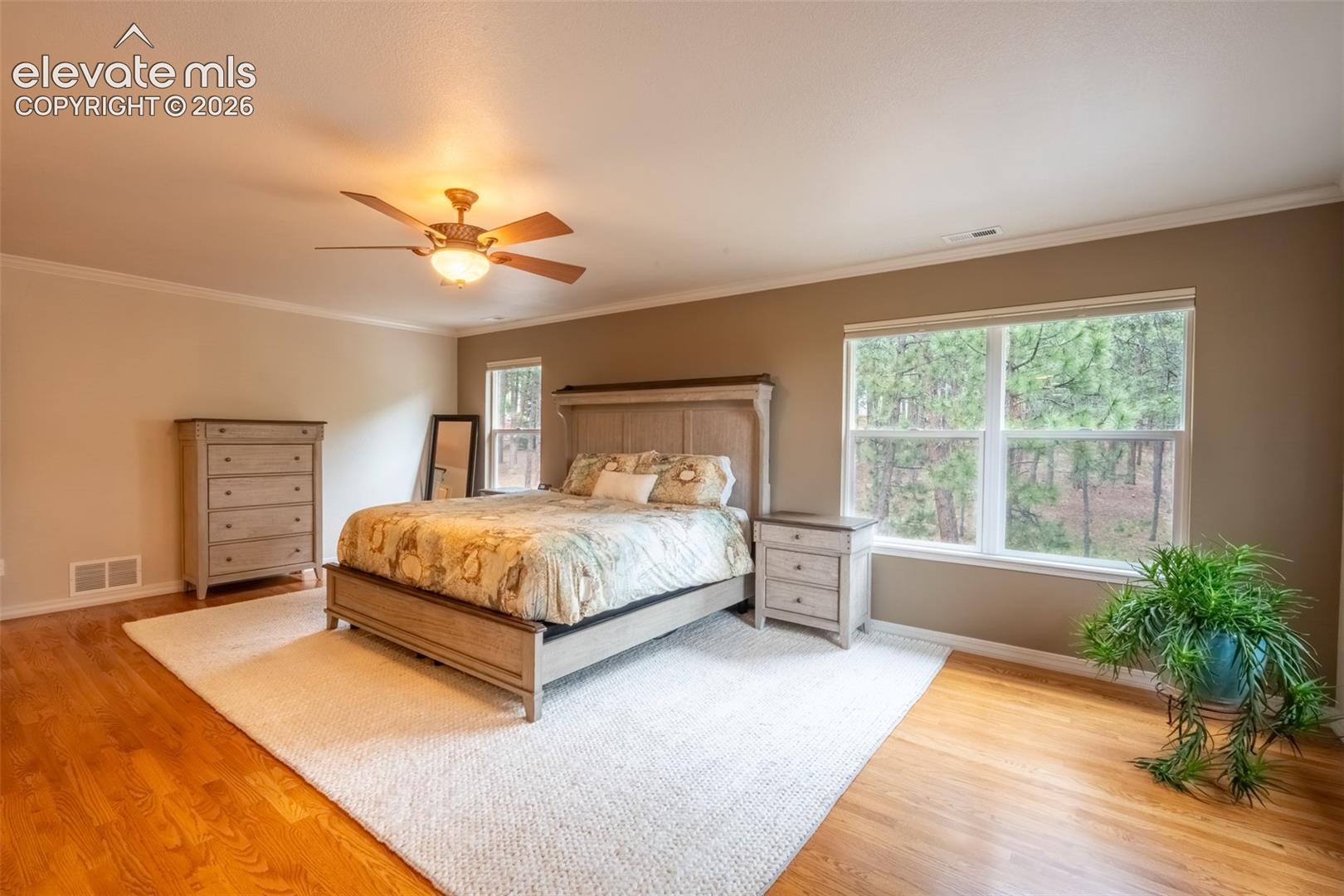 Primary bedroom (1) with fireplace, double walk in closet, and ensuite 5 piece bath - upper level