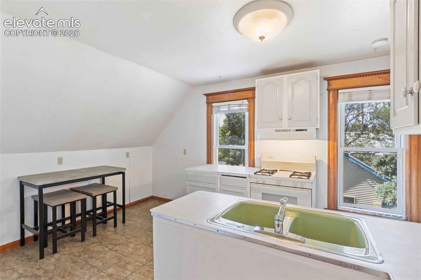 Upstairs kitchen with gas stove
