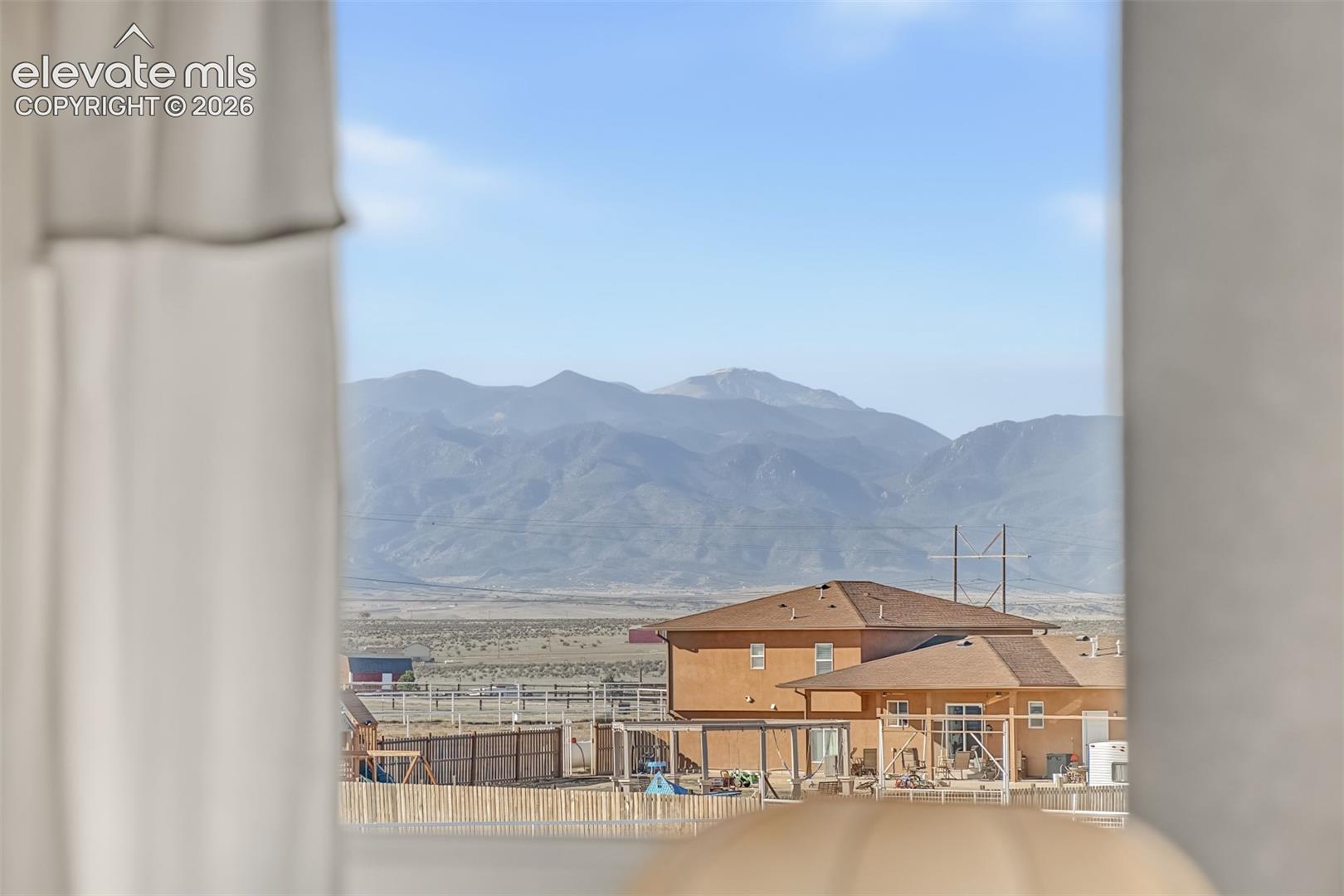 Enjoy Pikes Peak from your primary bedroom window.