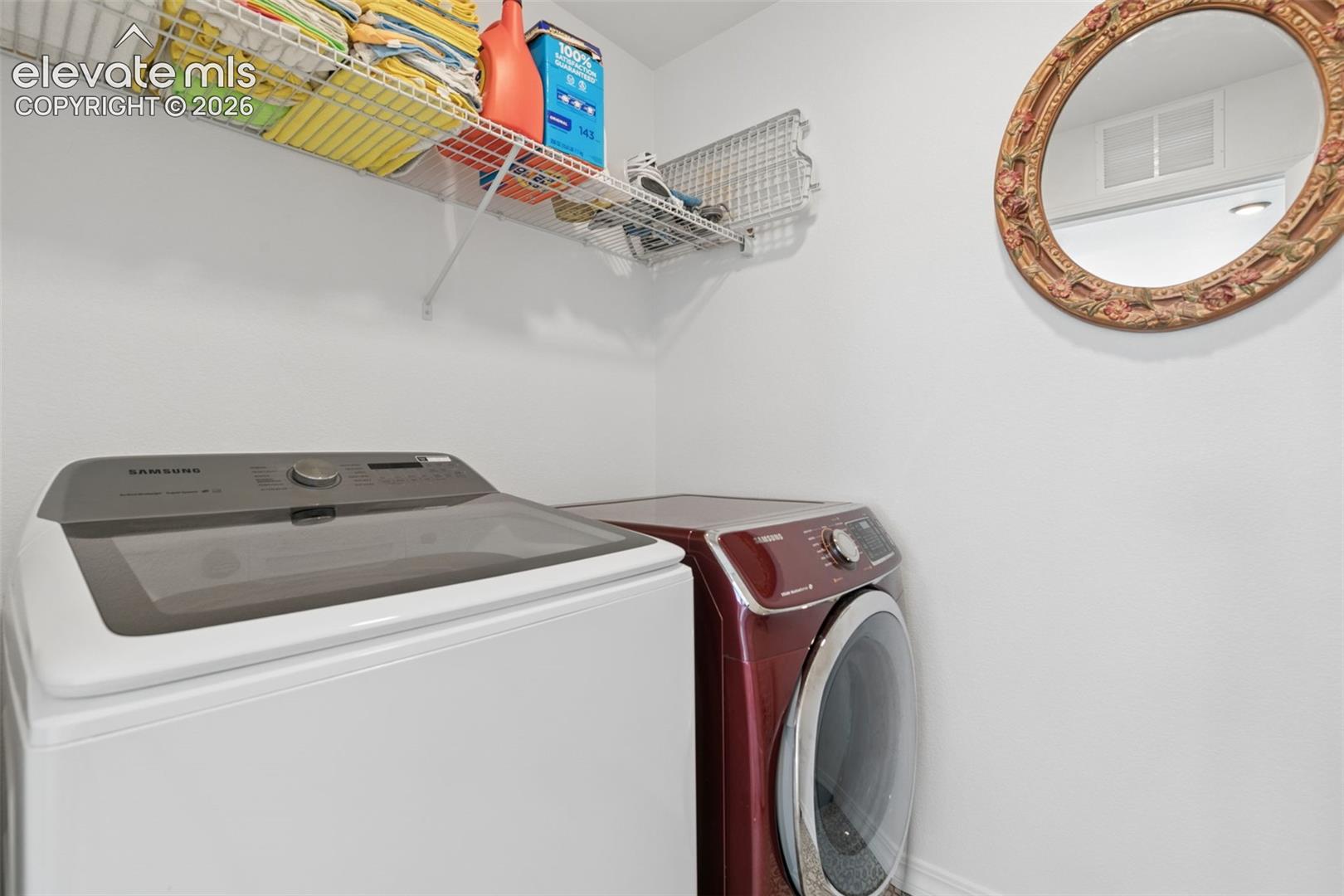 White walls with a single wire storage shelf