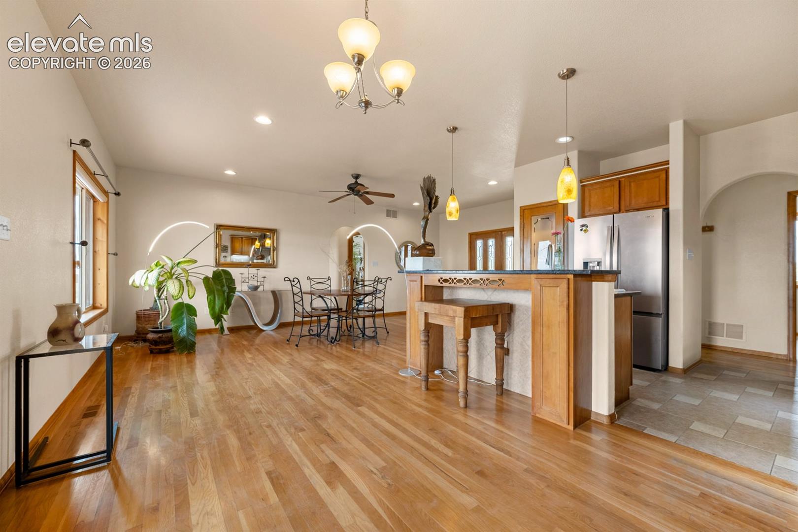 Lots of options for furniture placement.  Beautiful custom lighting throughout the home.