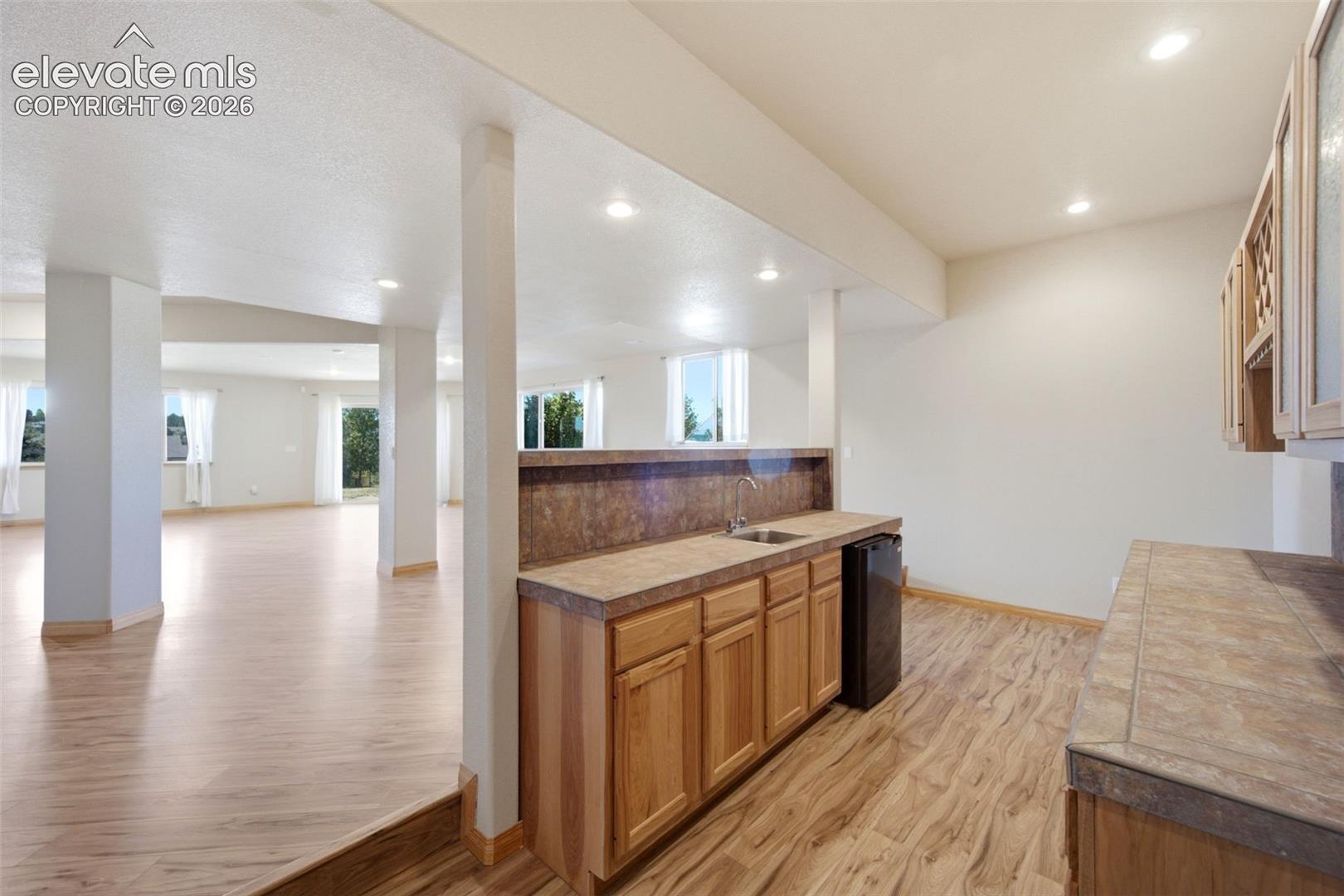 Wet Bar with bar fridge and sink