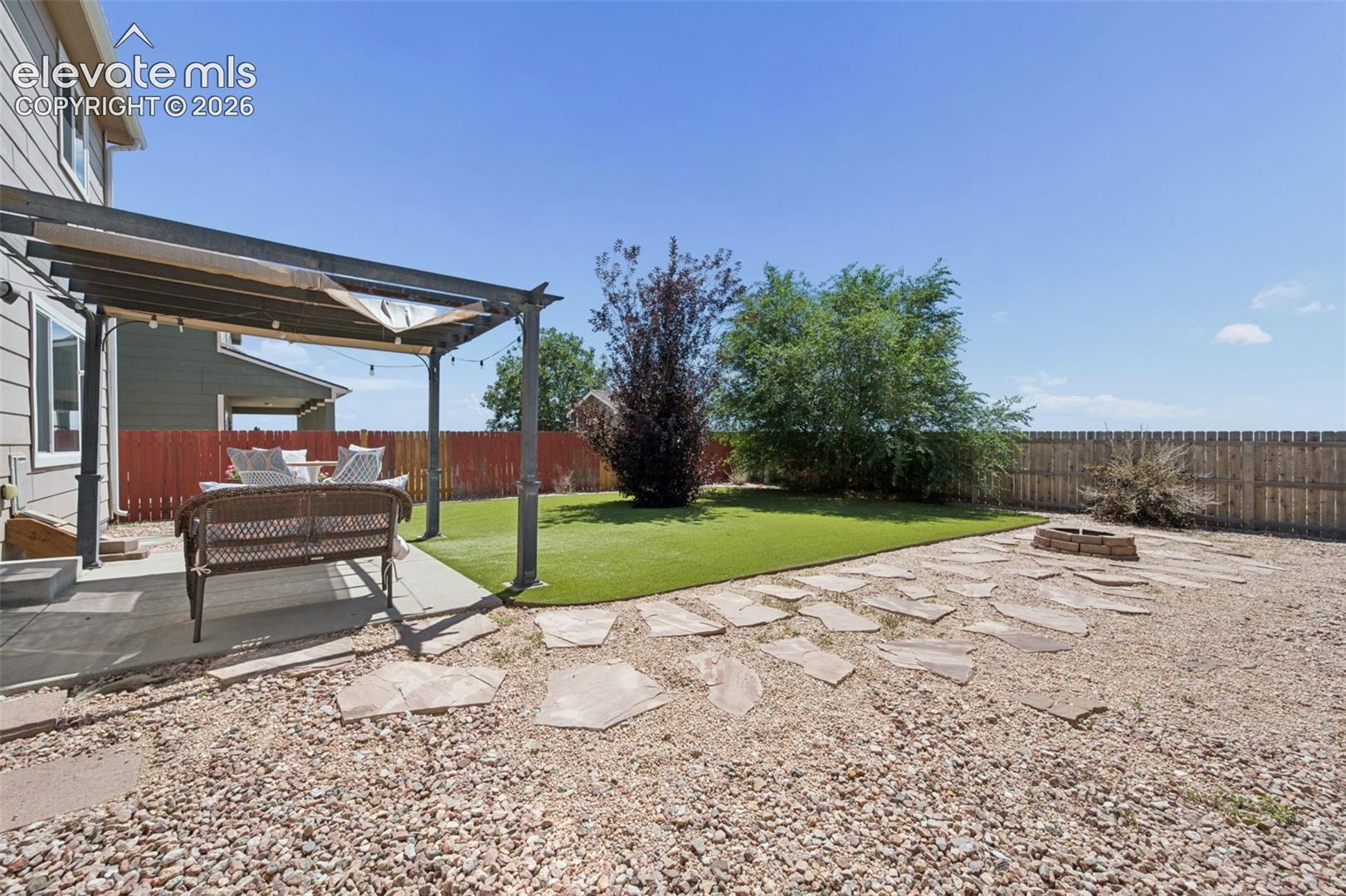 Huge Fenced In Backyard With Pergola