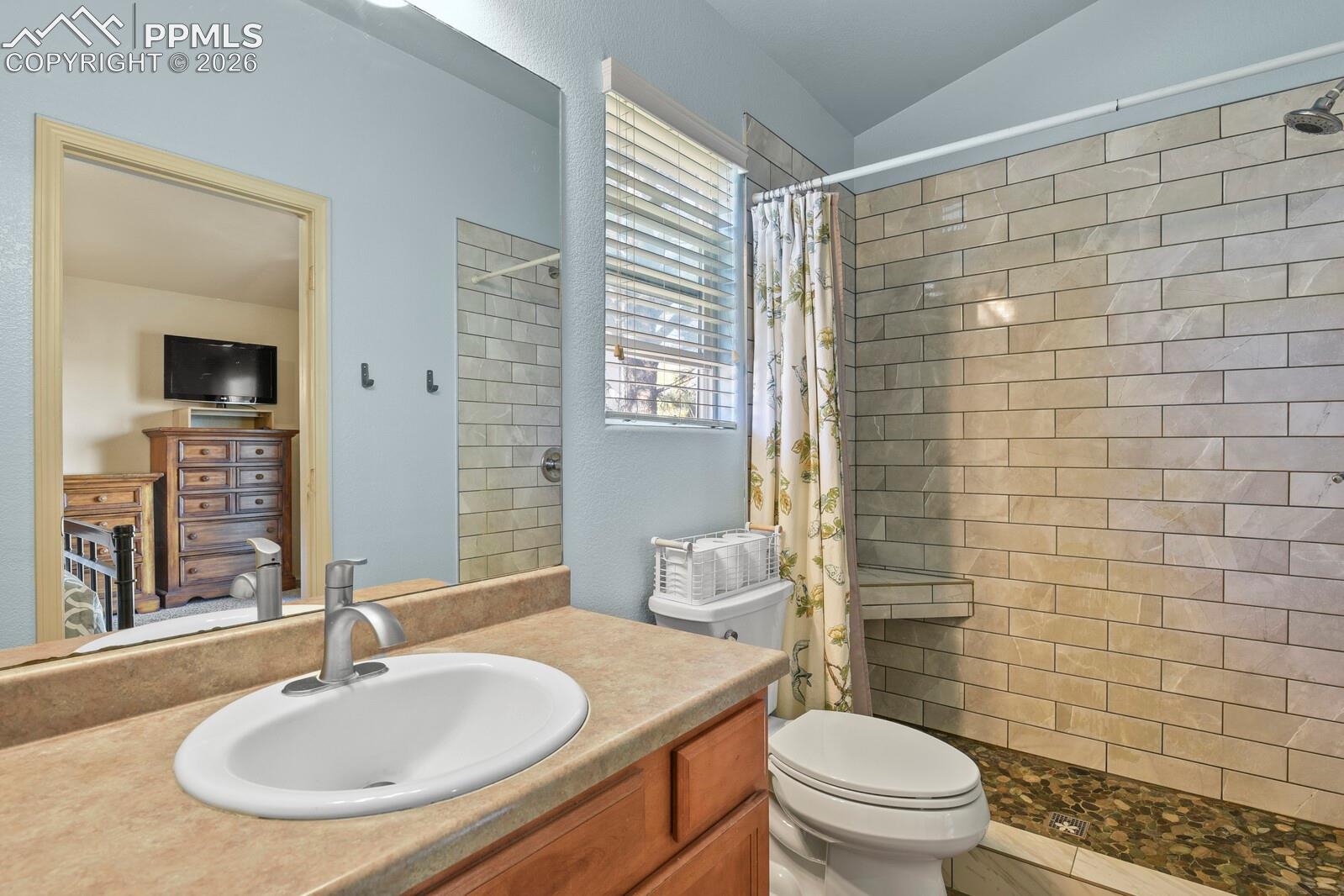 Walk-in shower with updated tile . 