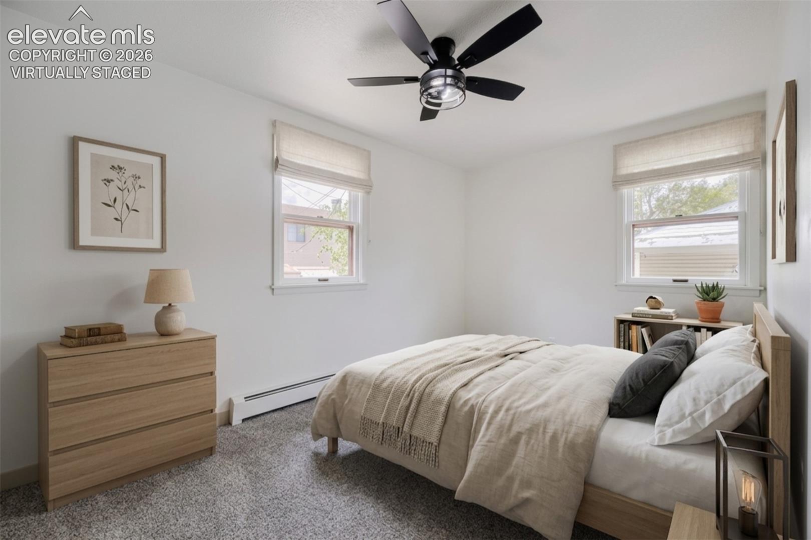 Light-colored wall-to-wall carpeting. Virtually staged.