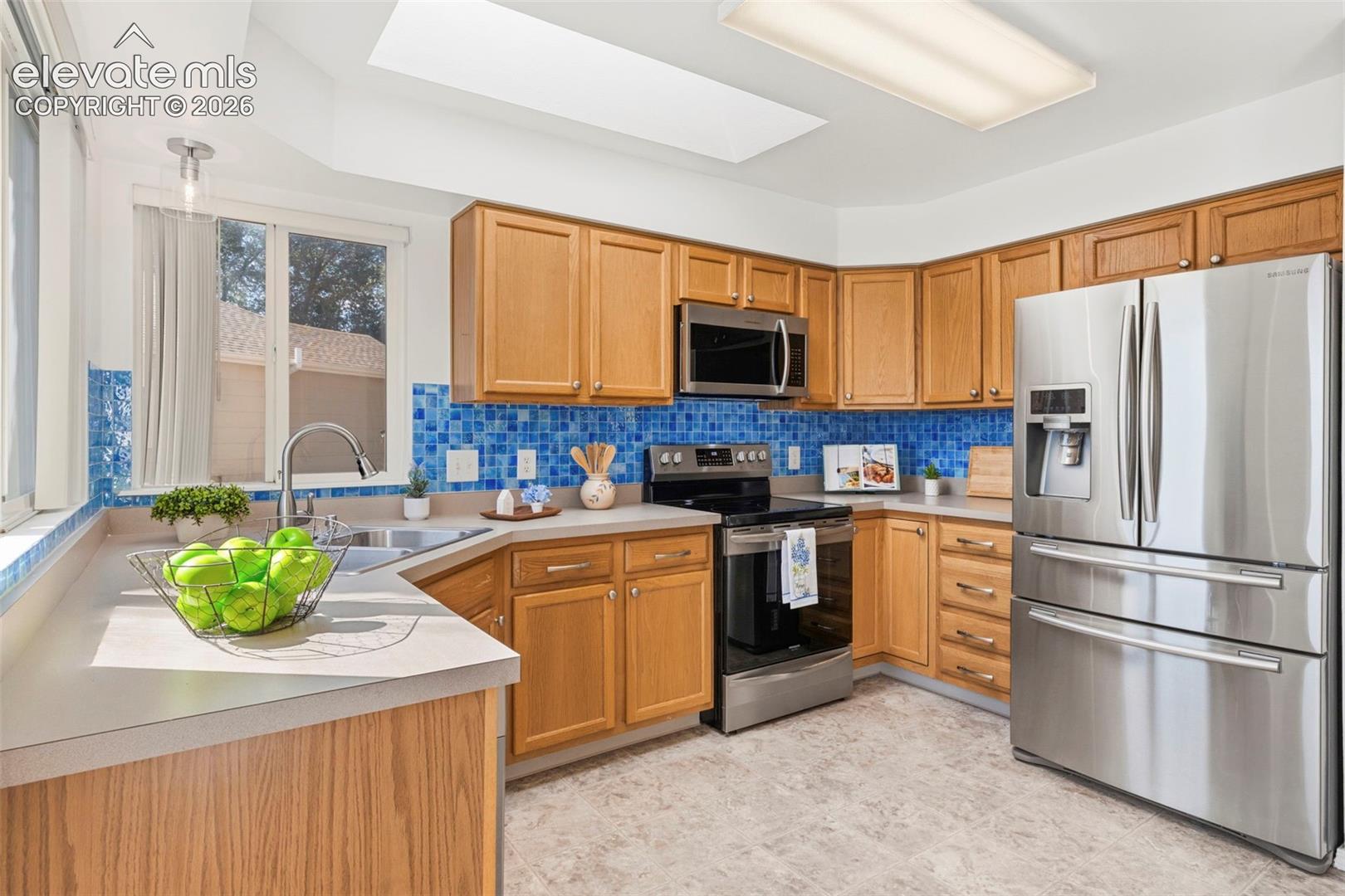 Spacious kitchen with updated SS appliances