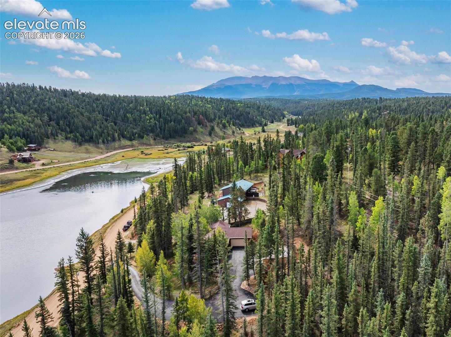 Ariel of property, lake and Pikes Peak!