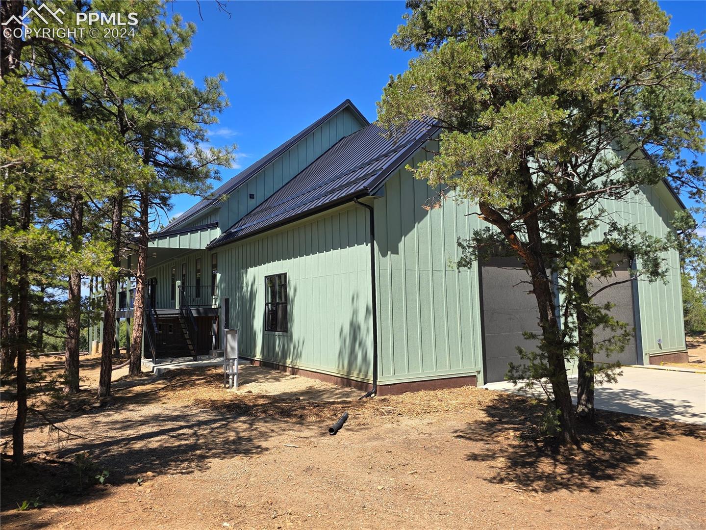 View of home's exterior featuring a garage