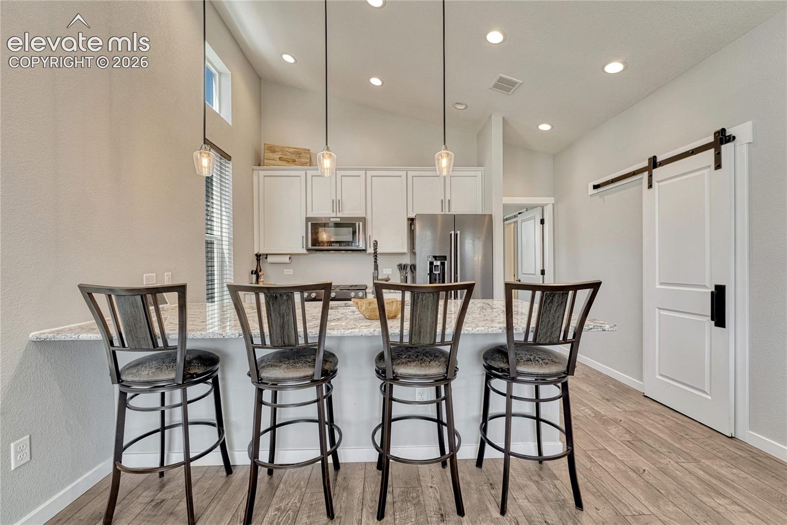 Kitchen has luxury vinyl flooring...